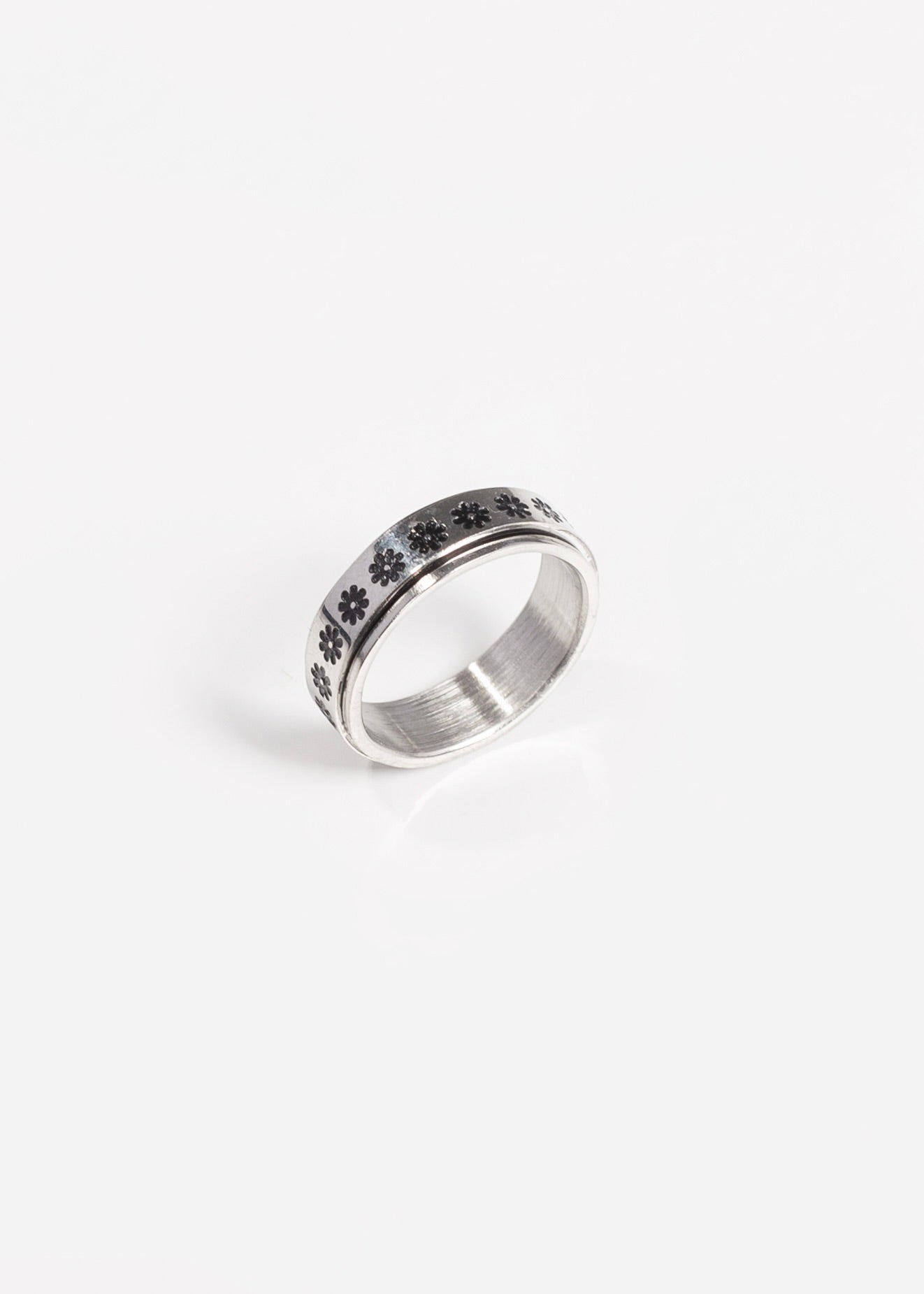 Anillo con flores giratorio acero quirúrgico