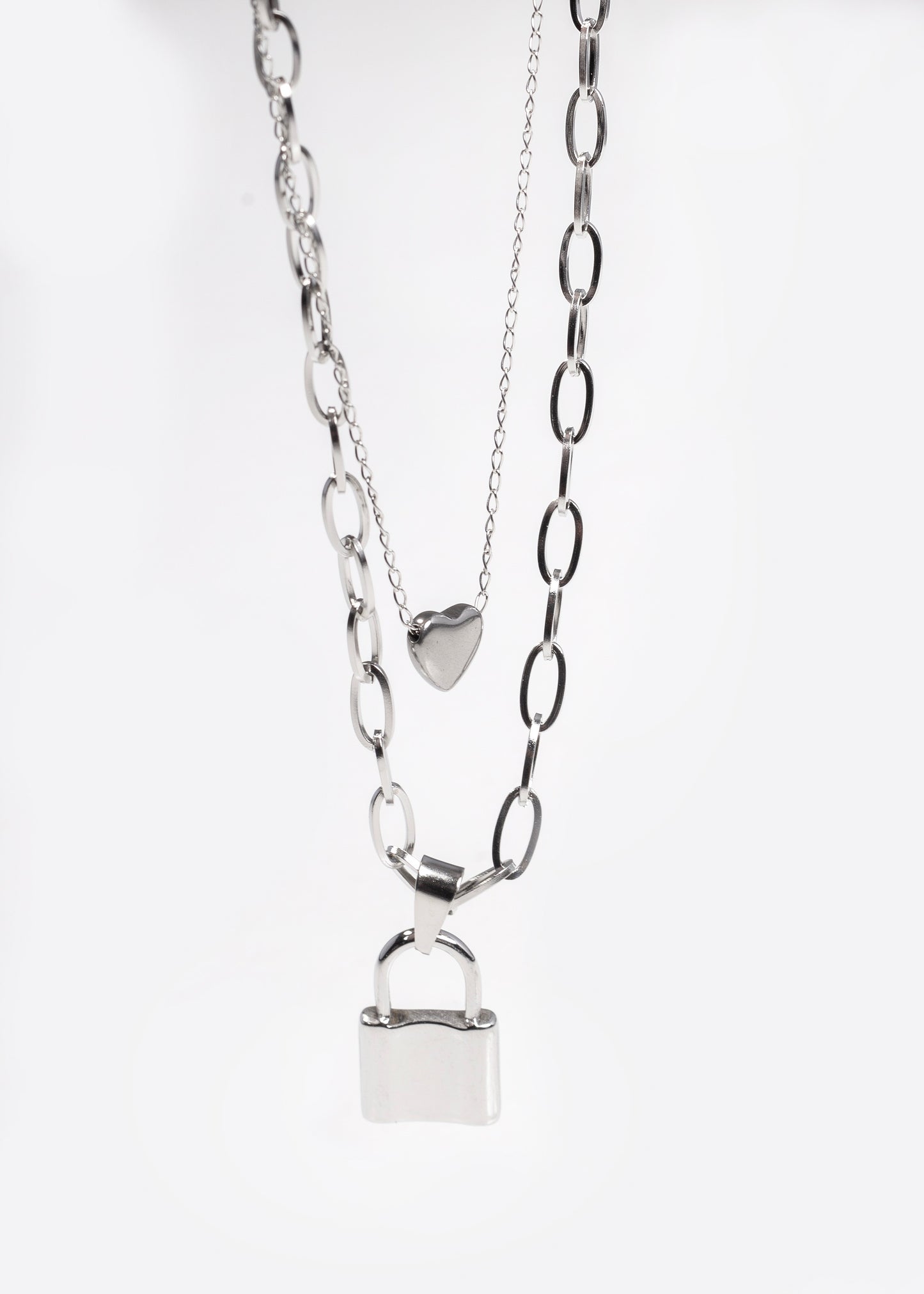 Cadena collar doble corazón y candado acero quirúrgico