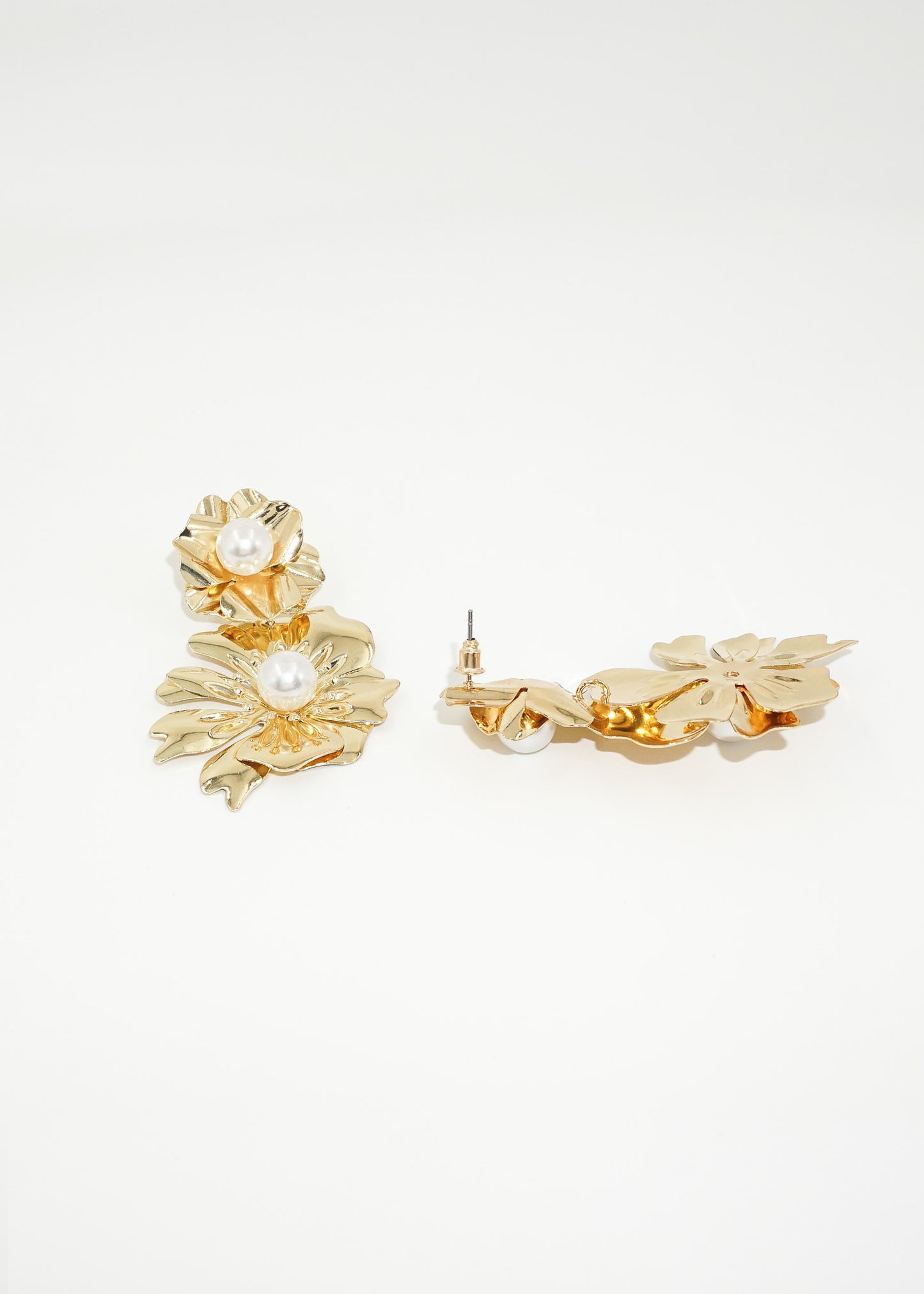 Caravanas flores con perla al centro