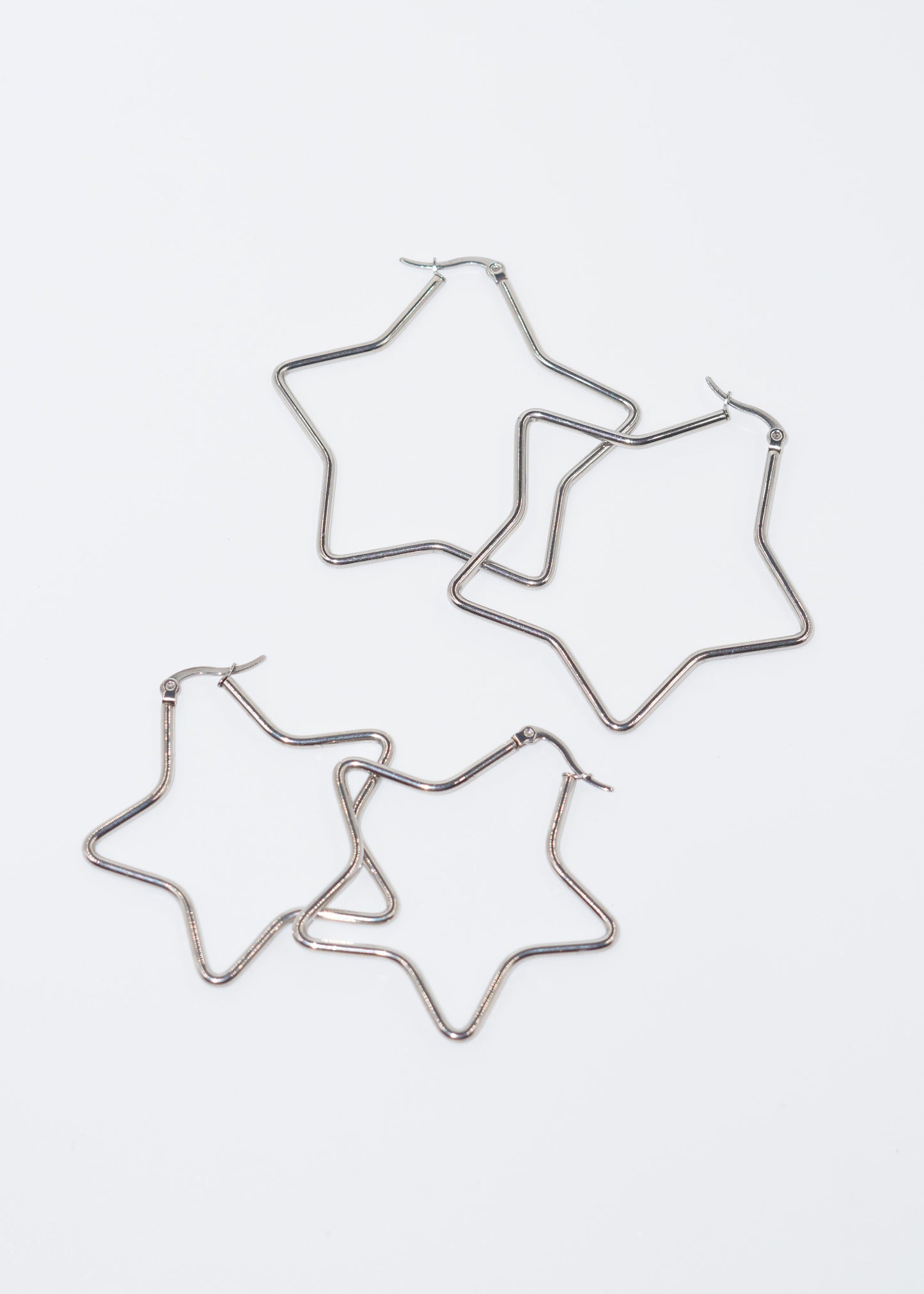 Aros caravanas con forma de estrella acero quirúrgico
