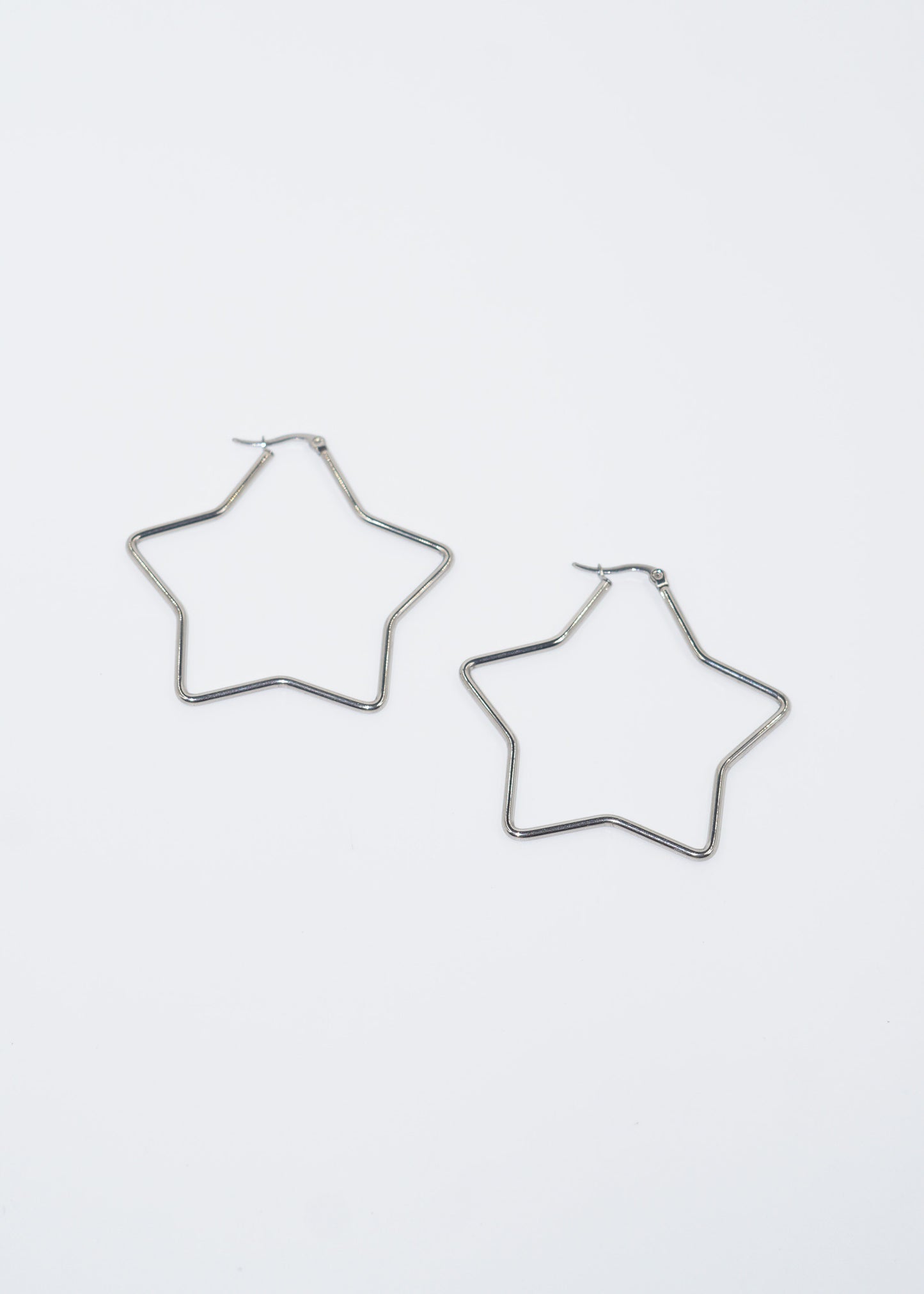Aros caravanas con forma de estrella acero quirúrgico