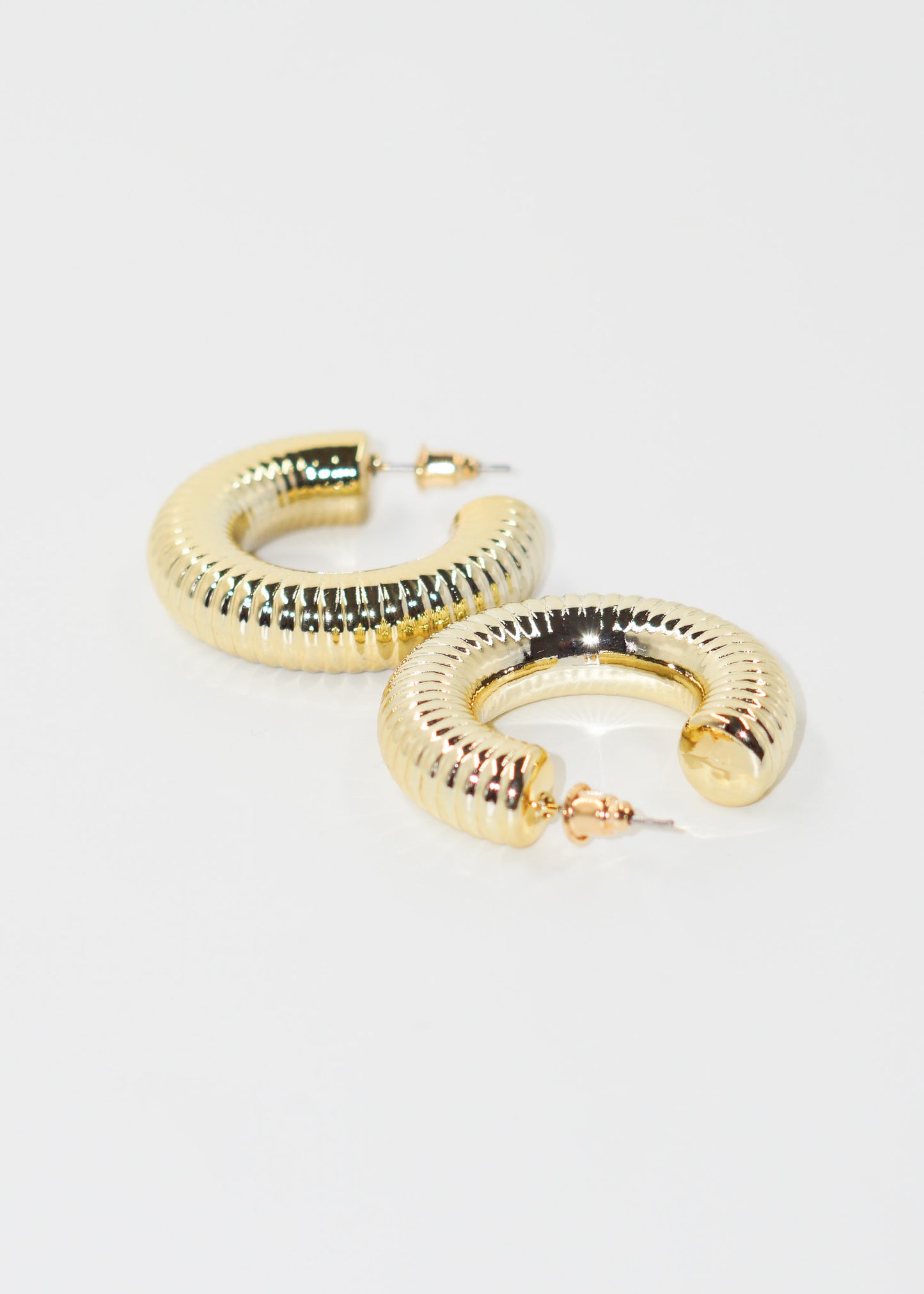 Caravanas medio aro chunky labrados