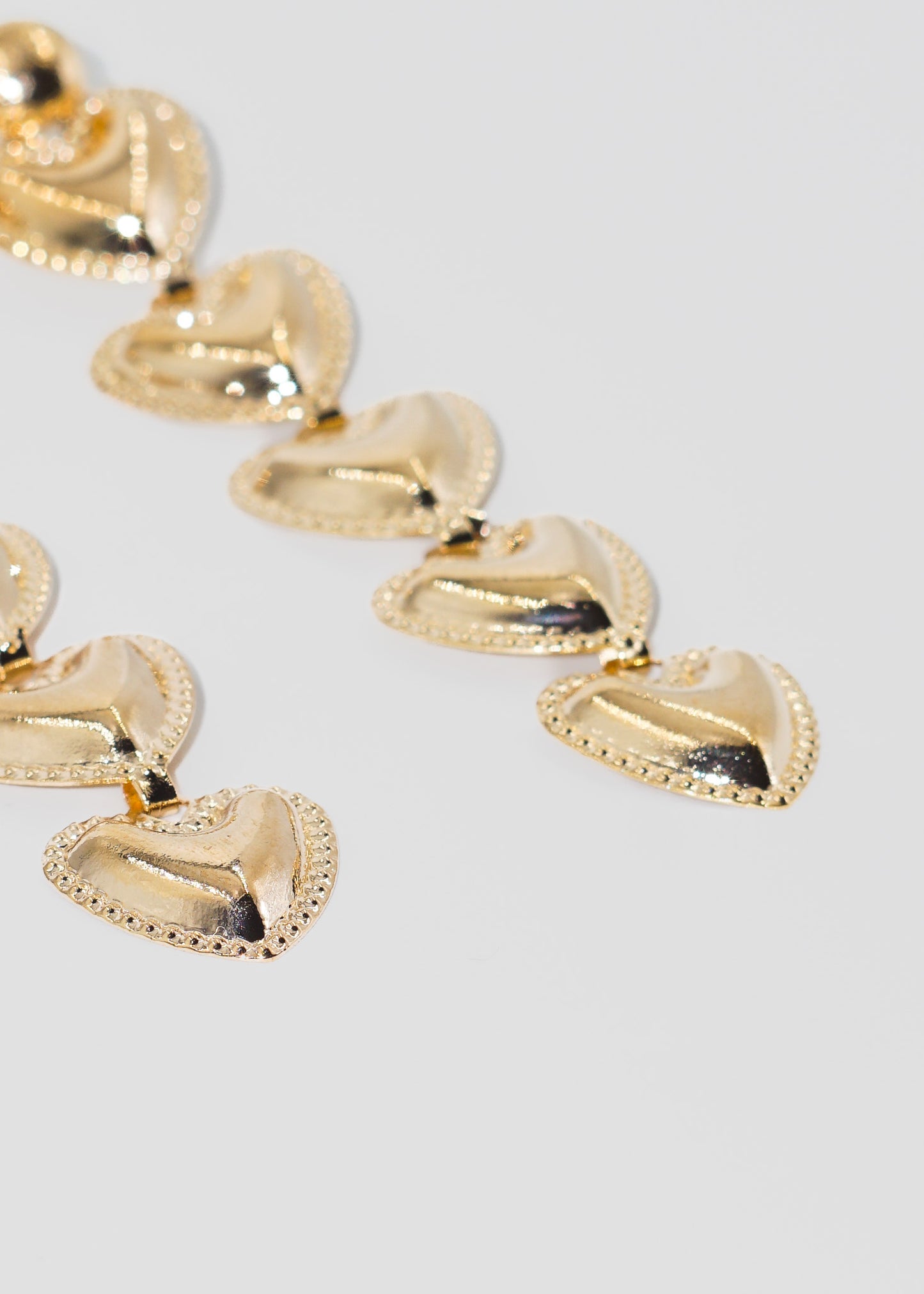 Caravanas largas en forma de corazones