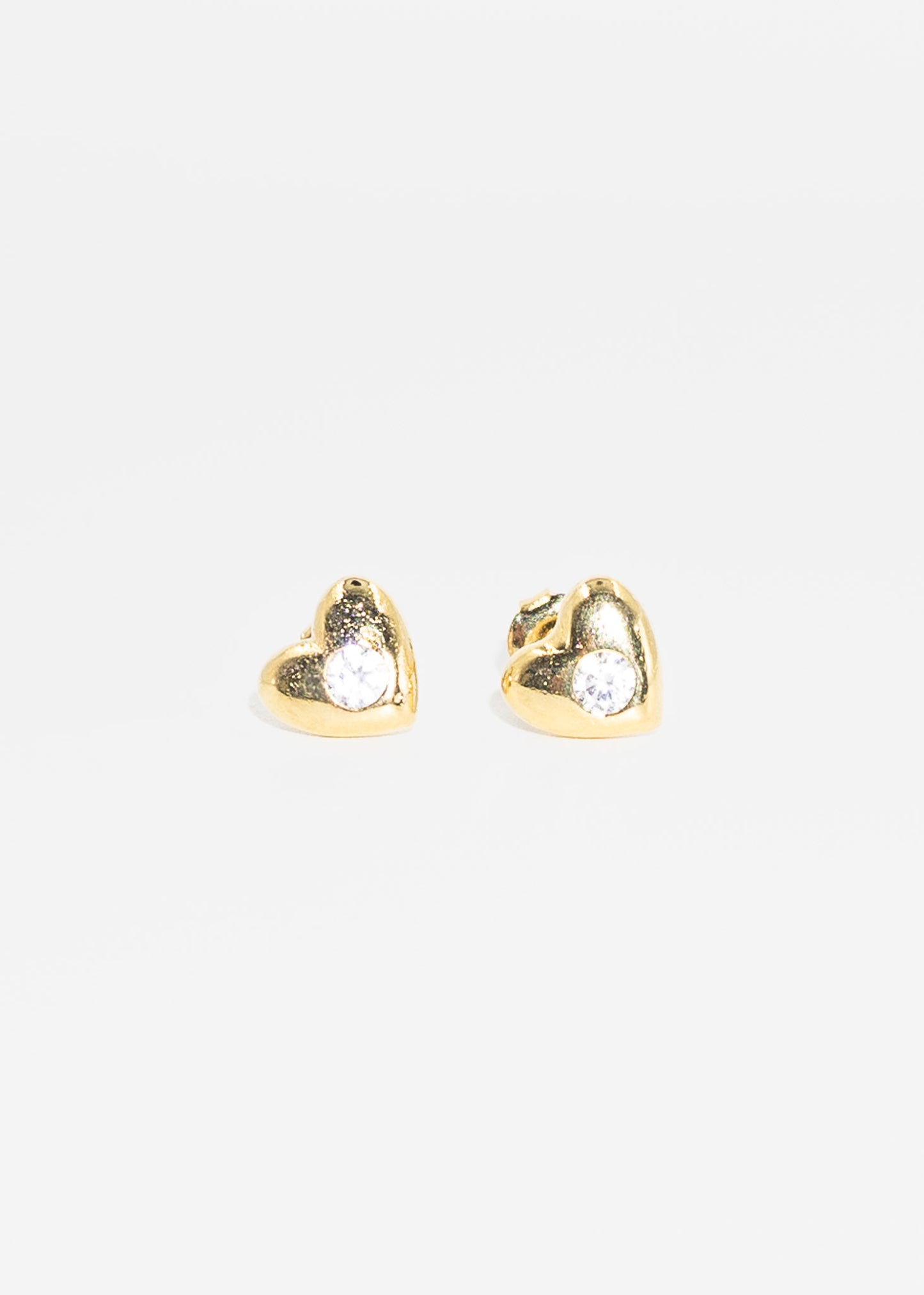 Caravanas corazón grande con punto luz baño en oro 18k