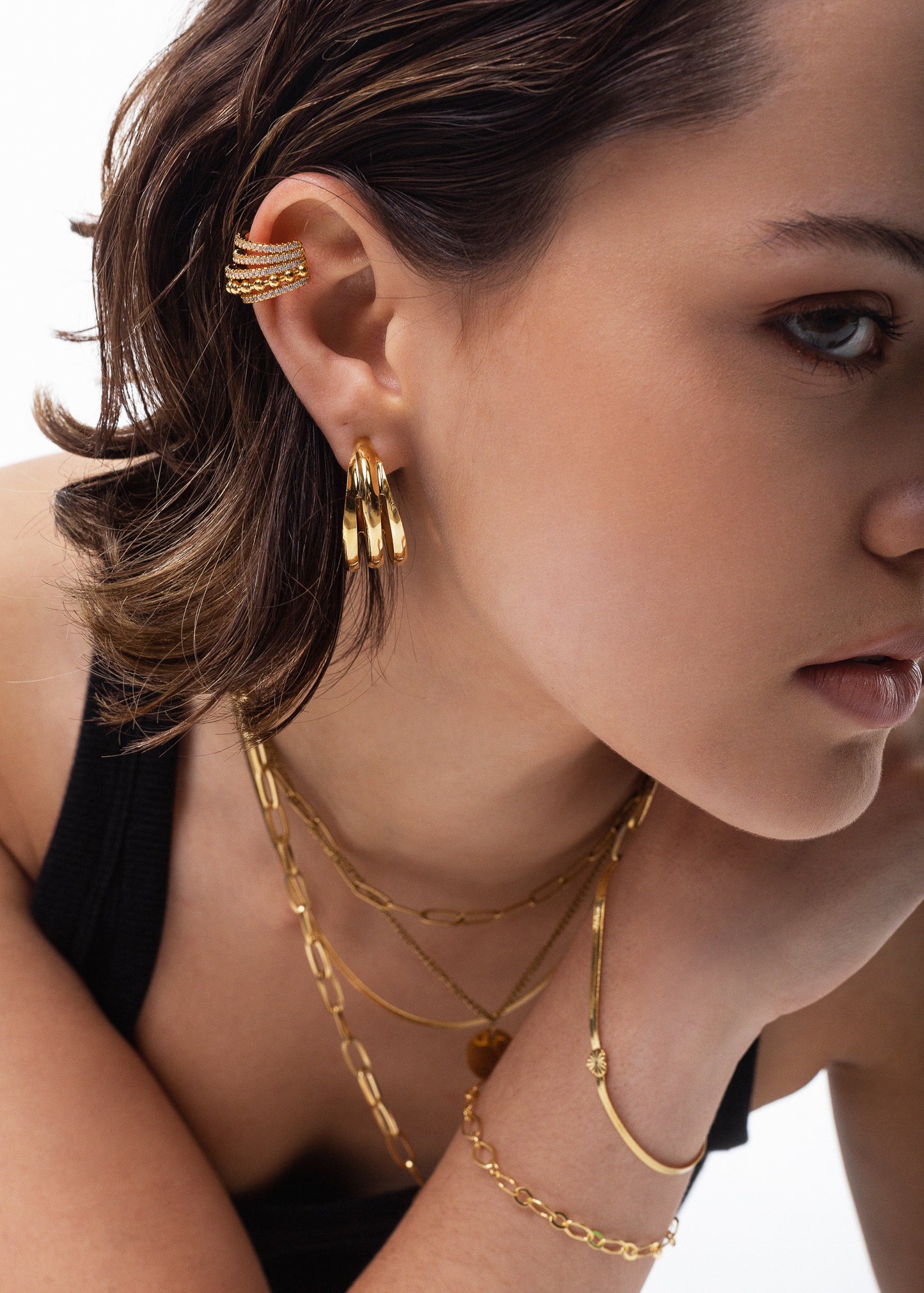 Ear cuff esferas y zirconia baño en oro 18k