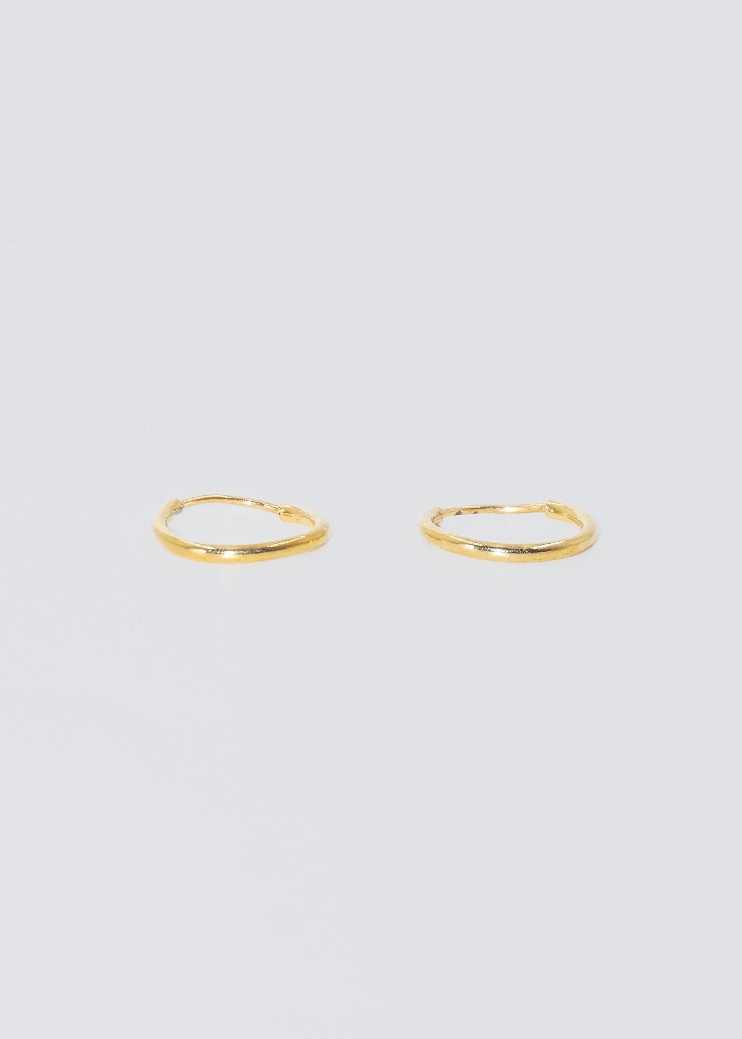 Caravanas aros básicos baño en oro 18k