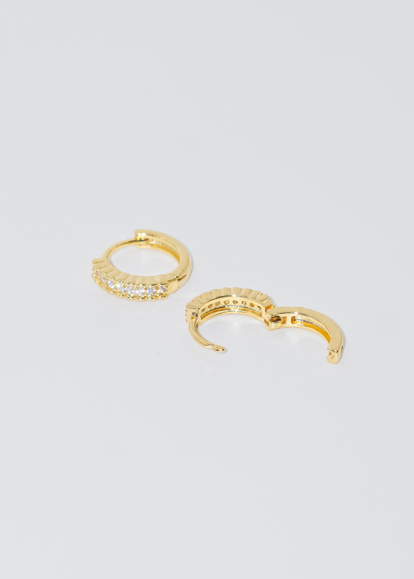 Caravanas aros con zirconia baño en oro 18k