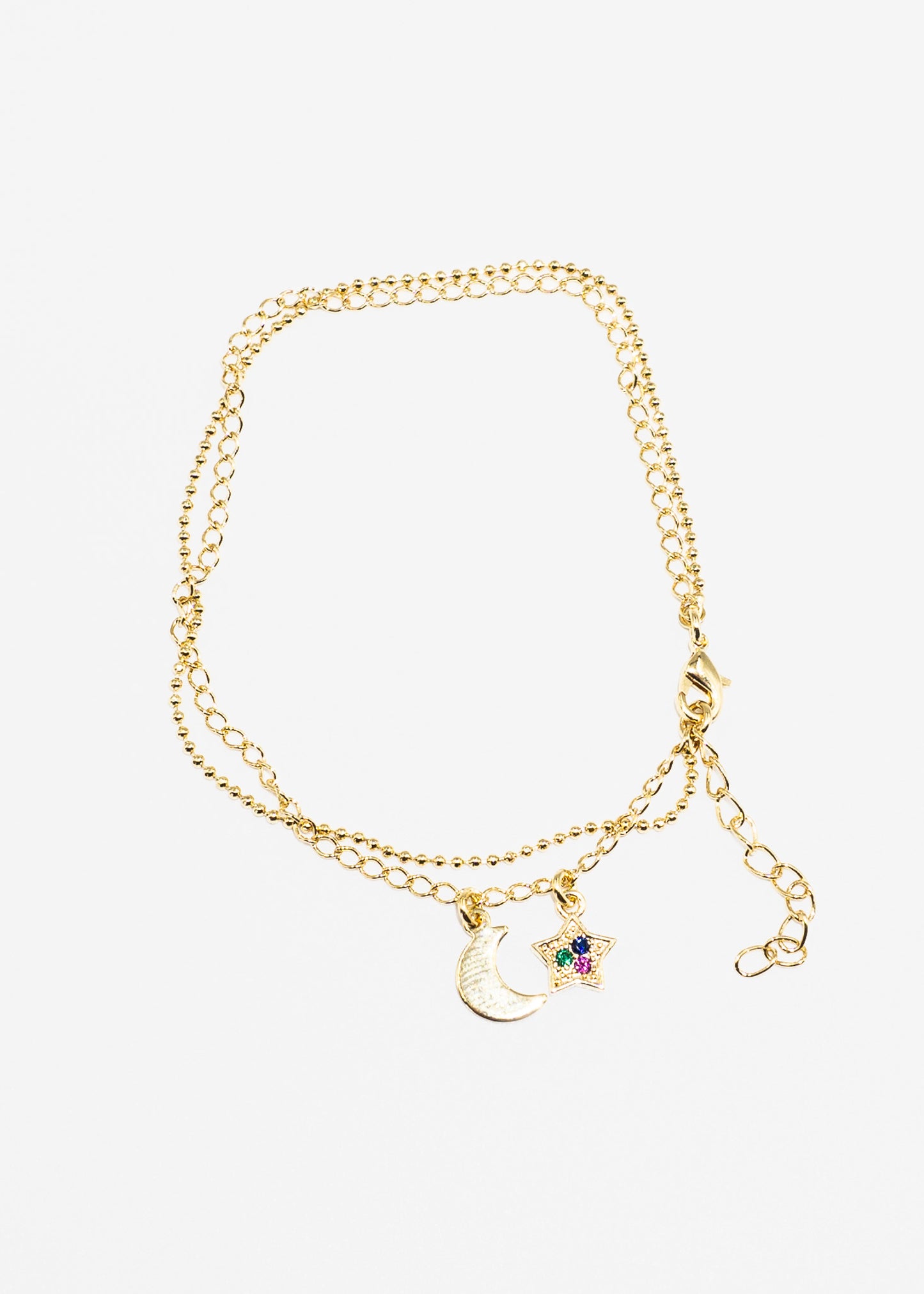 Pulsera doble dije luna y estrella zirconias baño en oro 18k