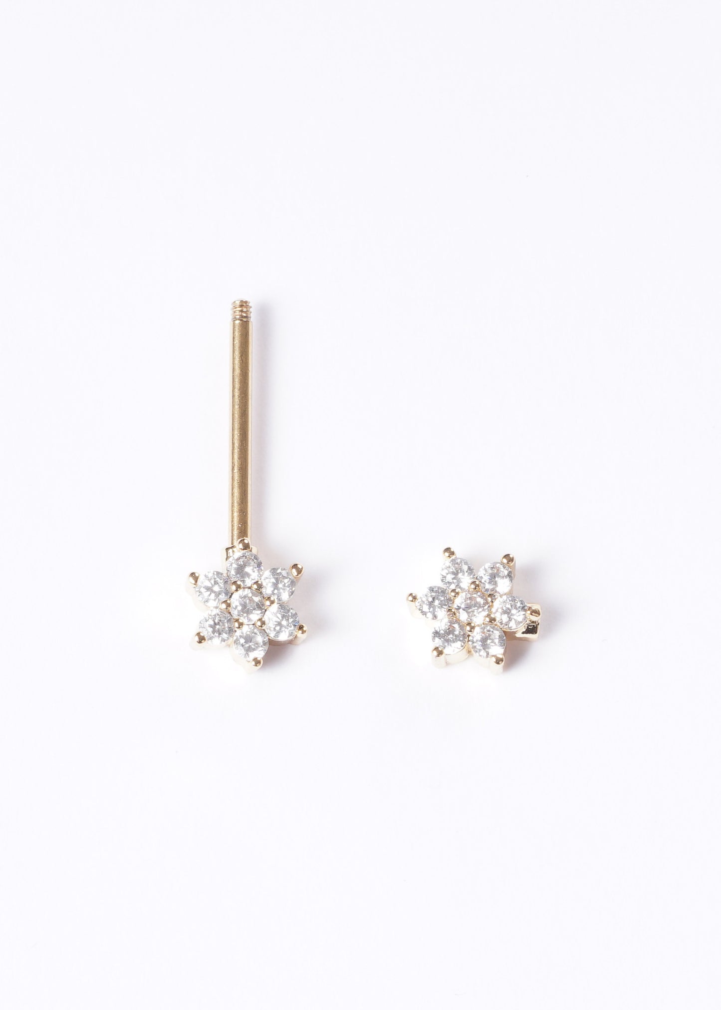 Piercing para pezón flor zirconia acero quirúrgico dorado