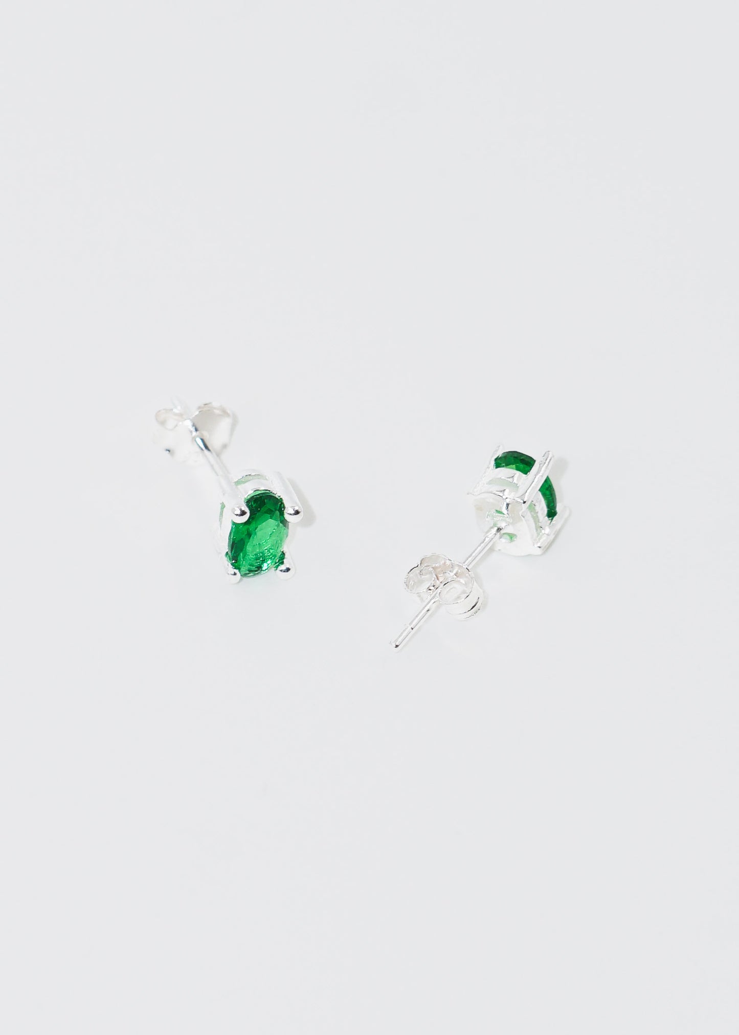 Caravanas oval zirconia verde plata 925