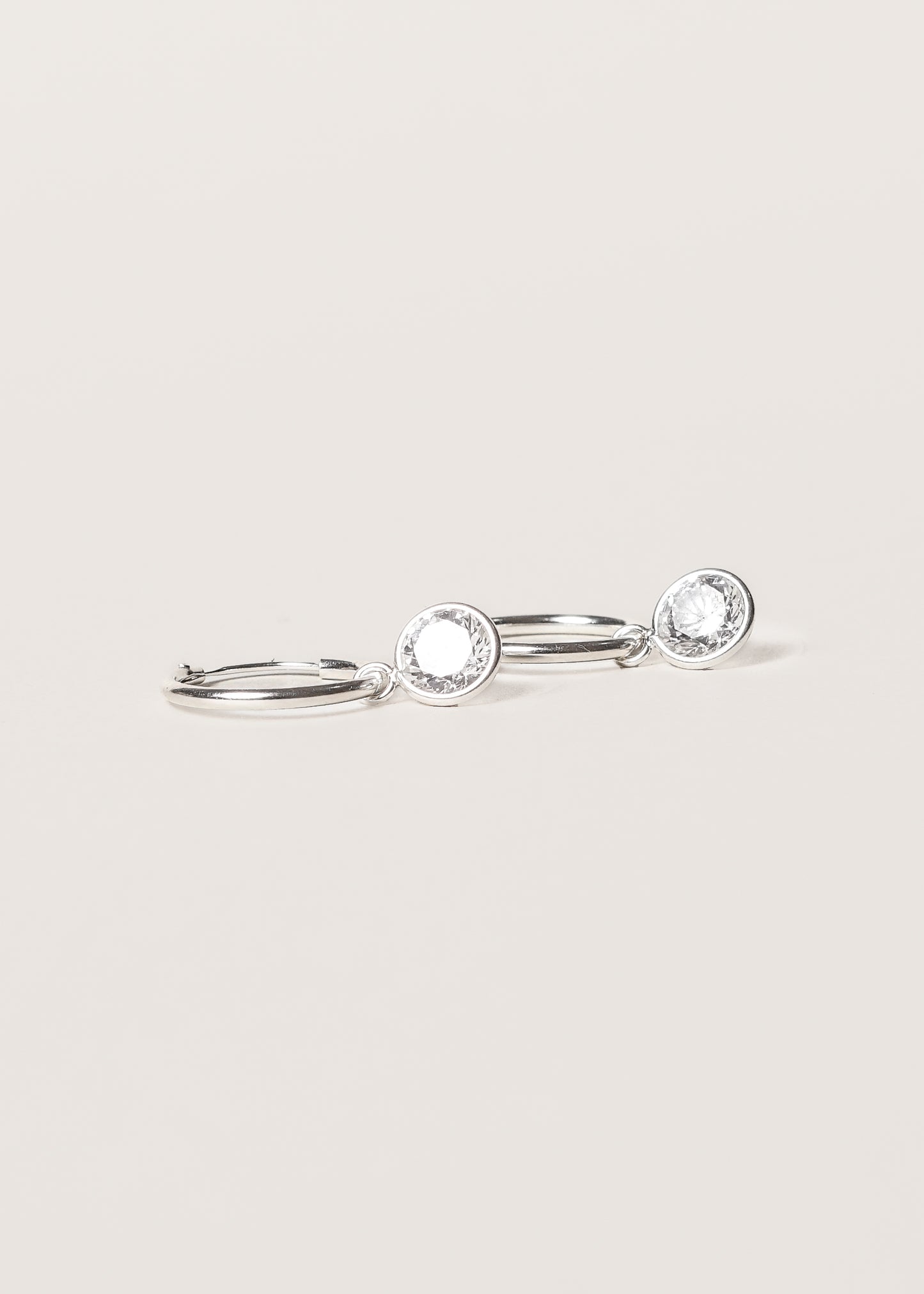 Caravanas aros con dije punto luz zirconia plata 925