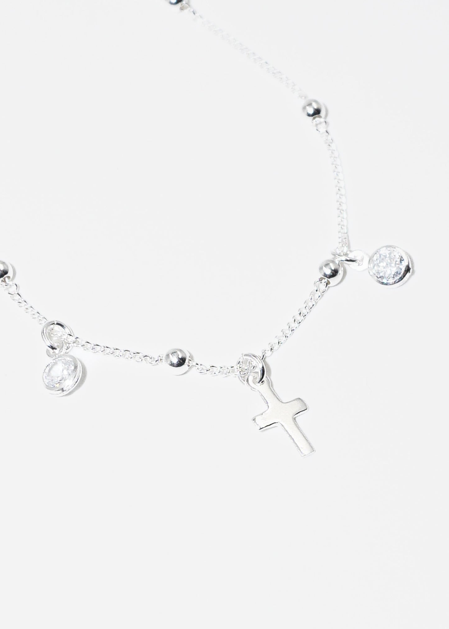 Pulsera groumet dije cruz y puntos luz plata 925