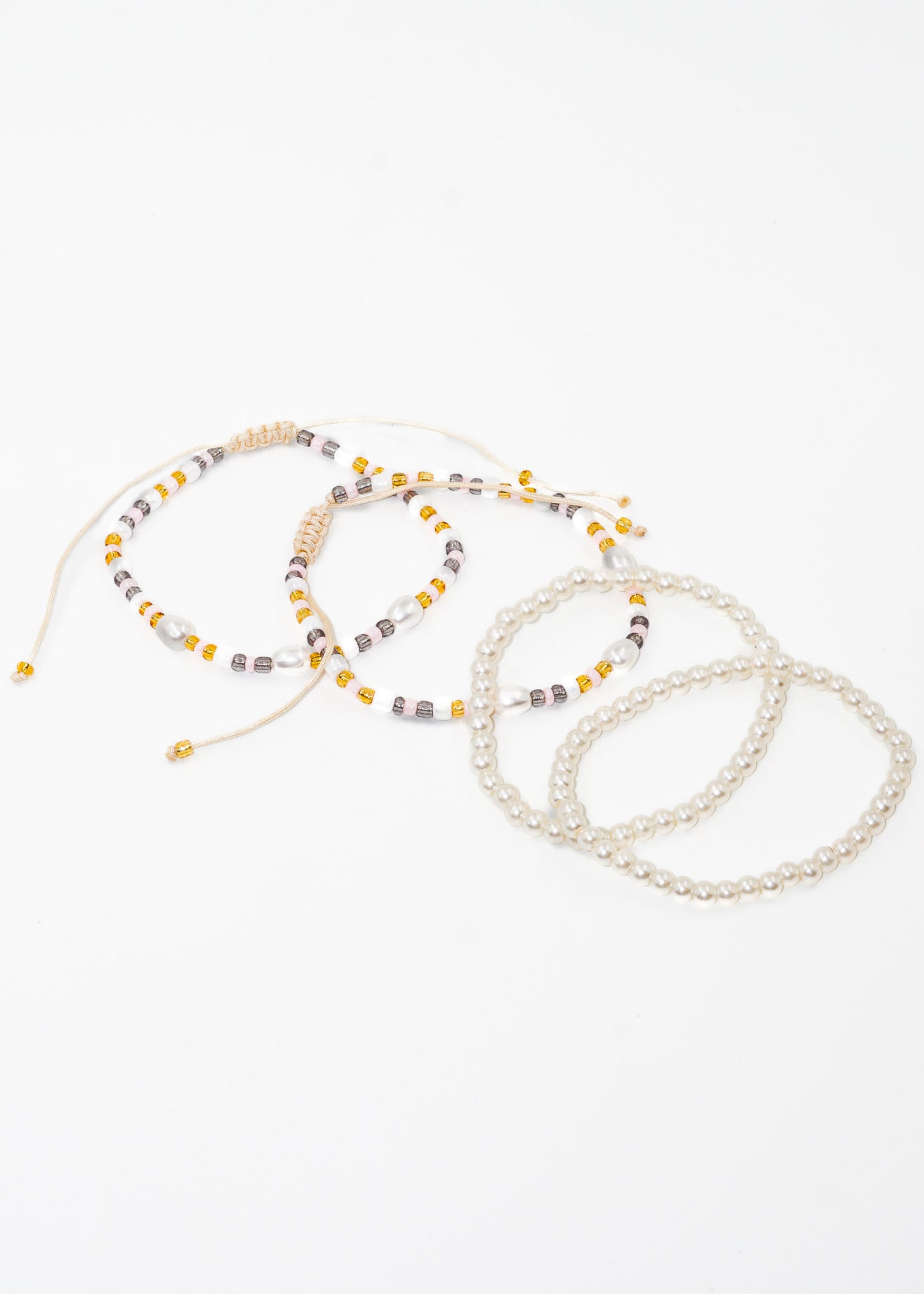 Pulseras ajustables set x4 perlas y mostacillas