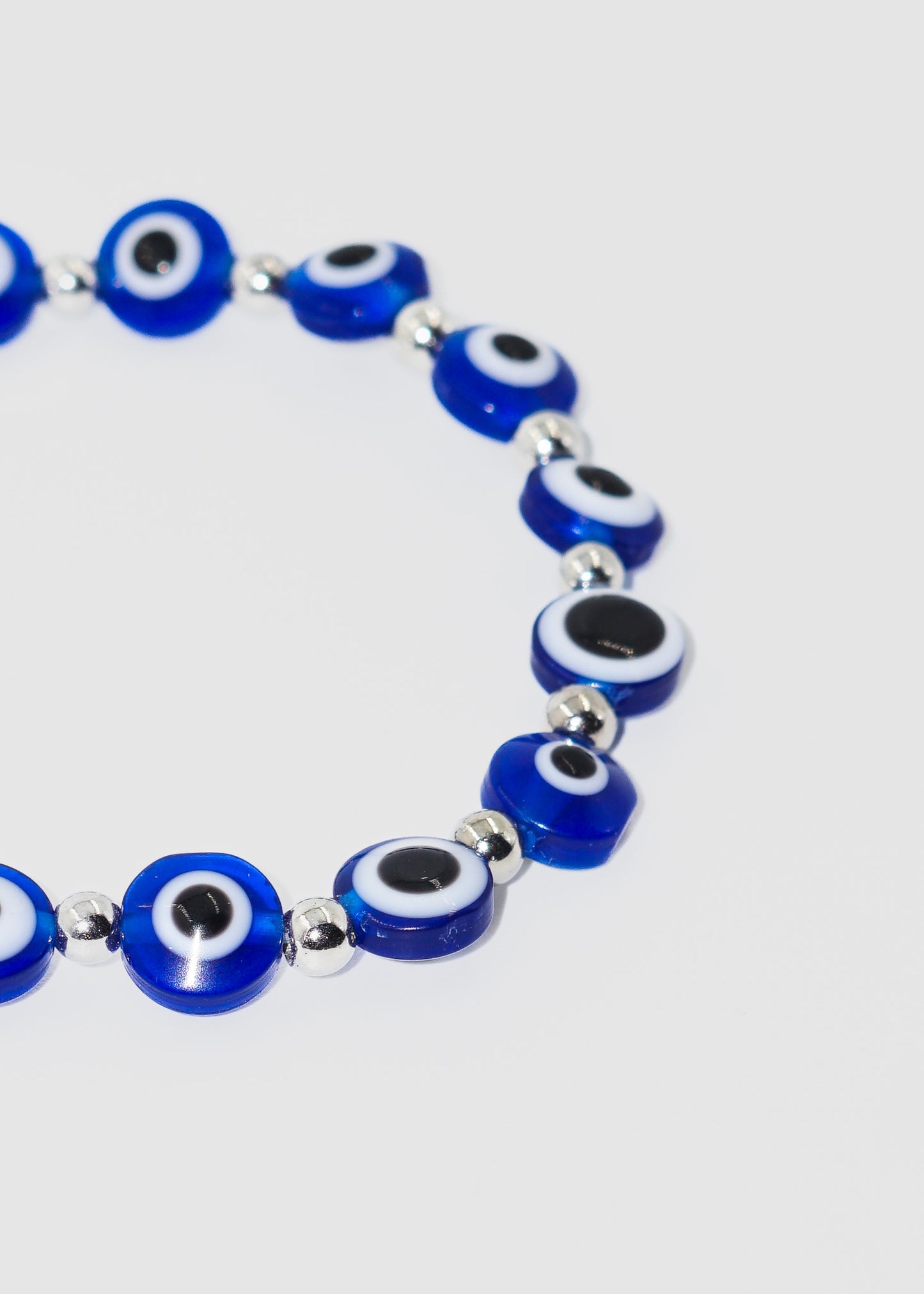 Pulsera ojos turcos y esferas elastizada