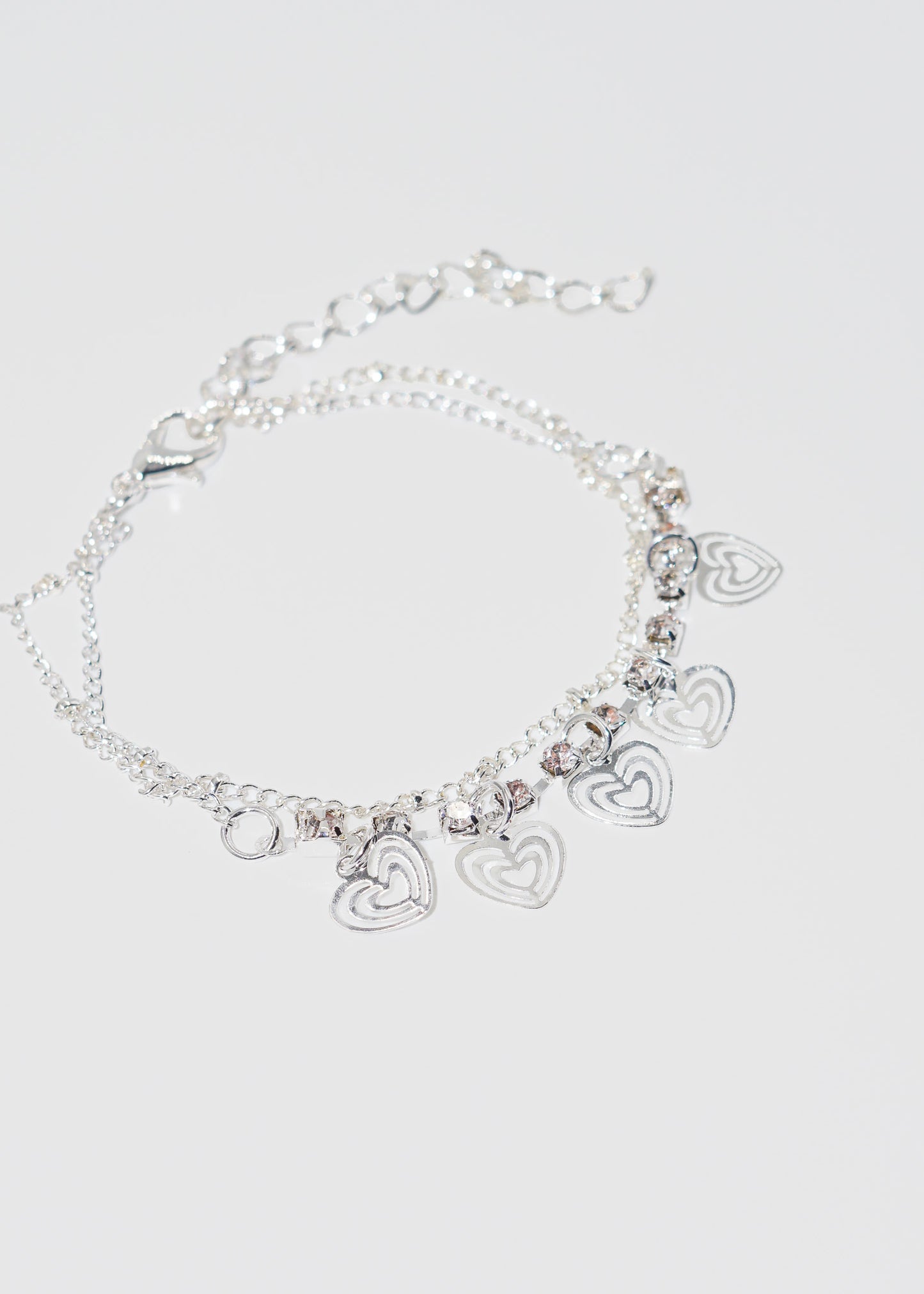 Pulsera doble corazones y puntos luz
