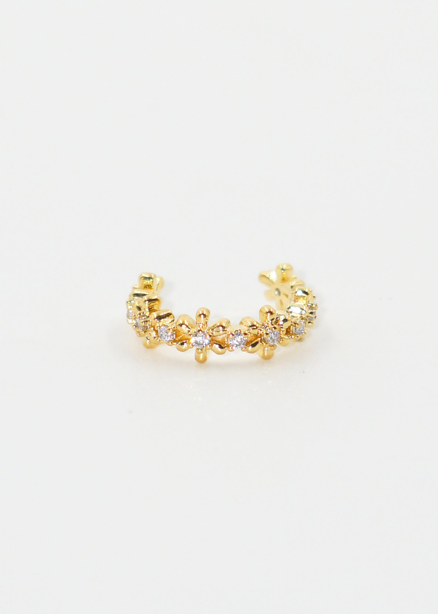 Ear cuff flores con puntos luz dorado