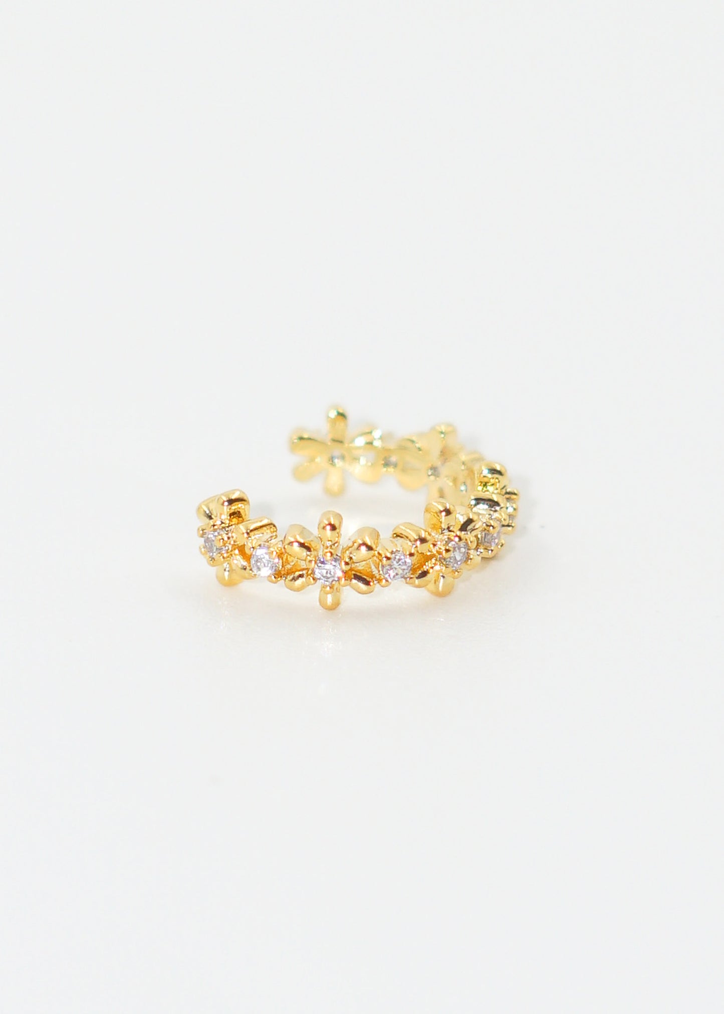 Ear cuff flores con puntos luz dorado