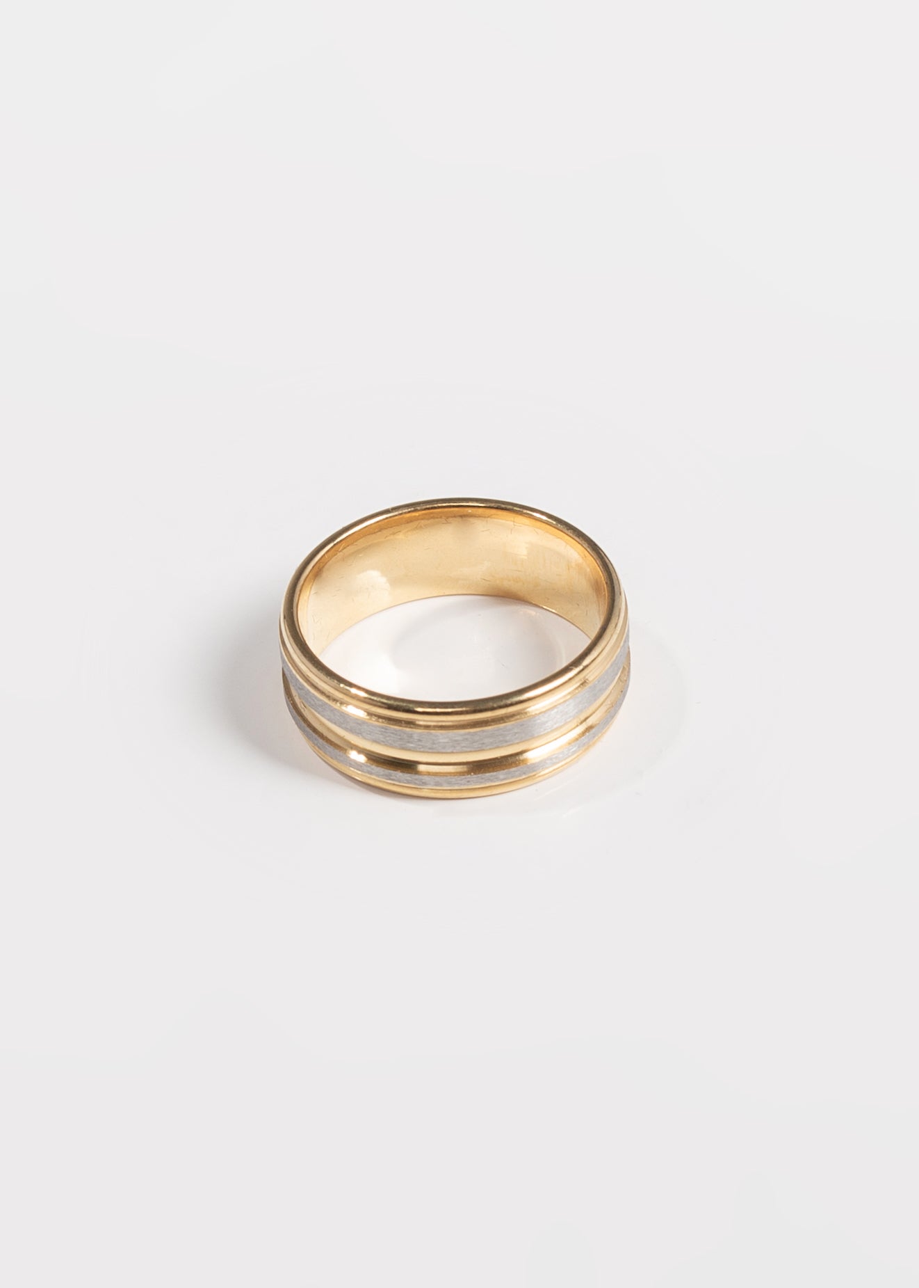 Anillo franjas plateadas y doradas acero quirúrgico