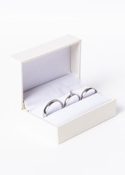 Set alianzas acero quirúrgico 4mm con cintillo y estuche - Doradas