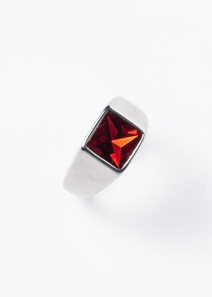 Anillo de mesa con piedra roja acero quirúrgico