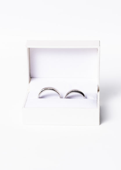 Alianzas anchas 6mm + estuche acero quirúrgico plateado