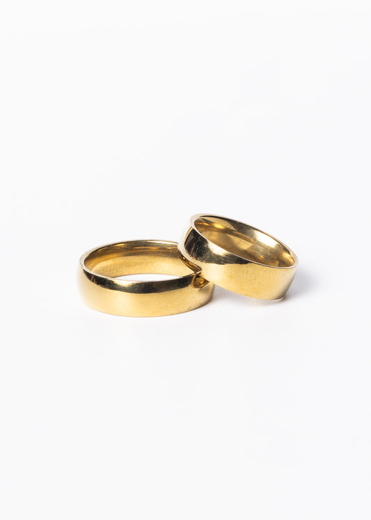 Alianzas anchas 6mm + estuche acero quirúrgico dorado