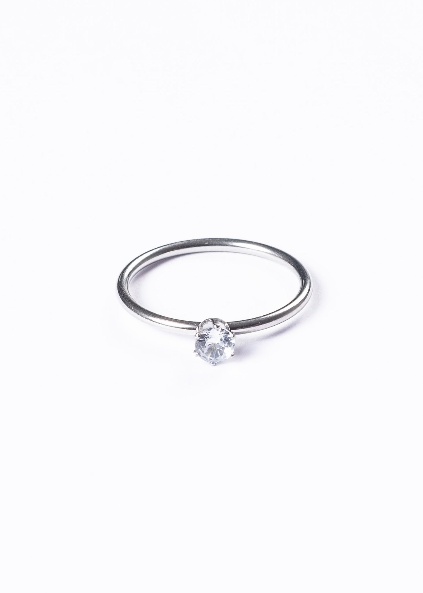 Anillo piedra brillo 4mm - Acero quirúrgico plateado