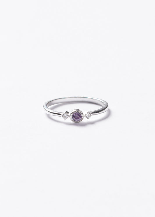 Anillo punto luz violeta y laterales plata 925