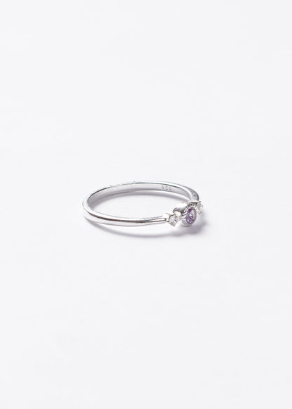 Anillo punto luz violeta y laterales plata 925