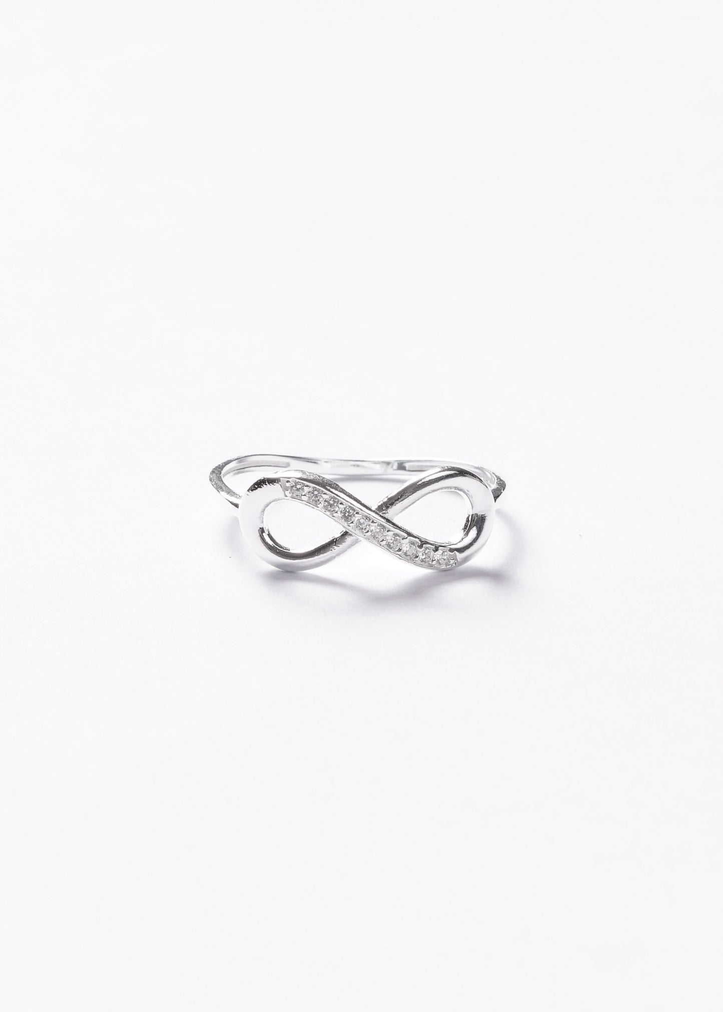 Anillo infinito mitad zirconias plata 925