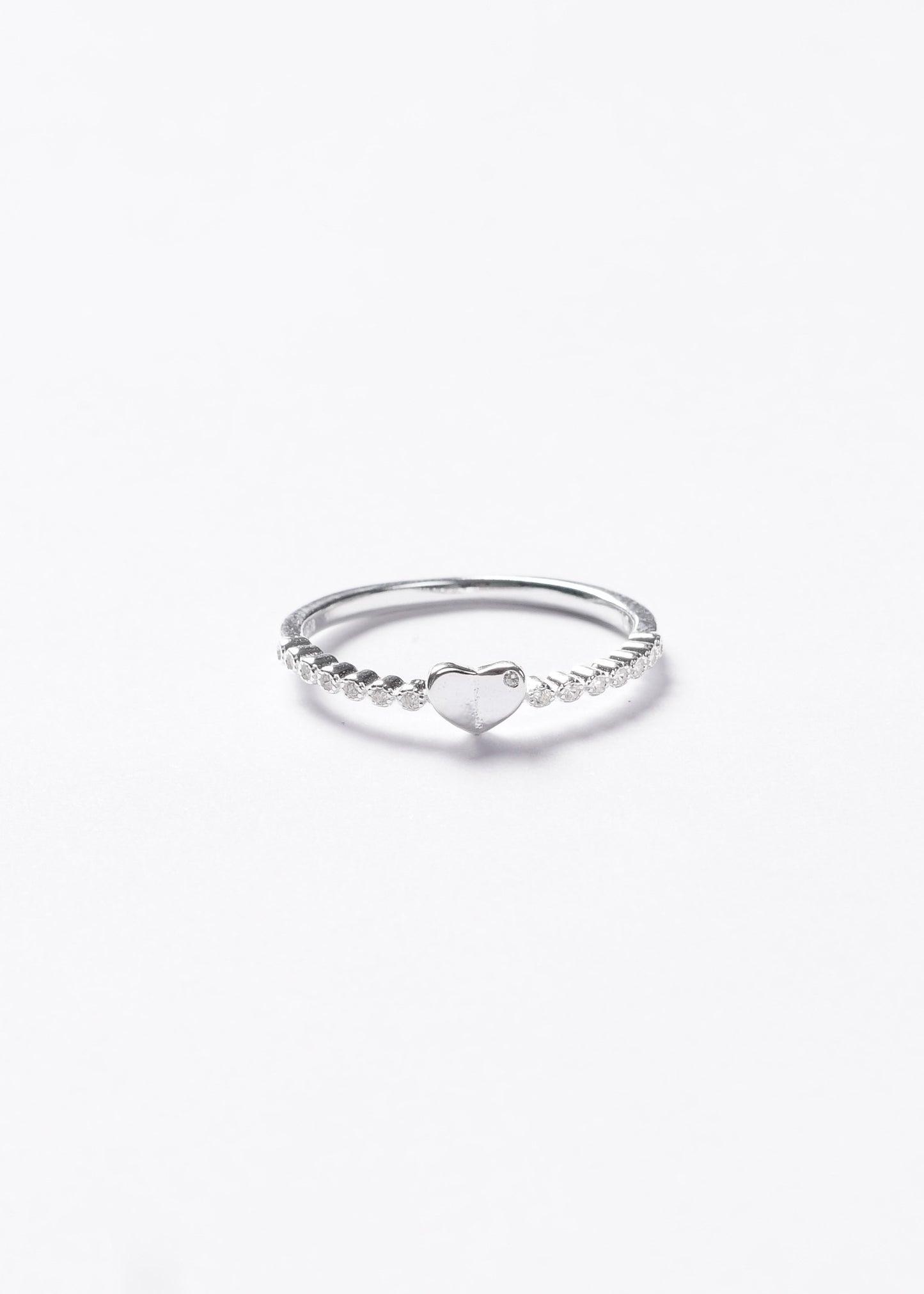 Anillo corazón liso con puntos luz laterales plata 925
