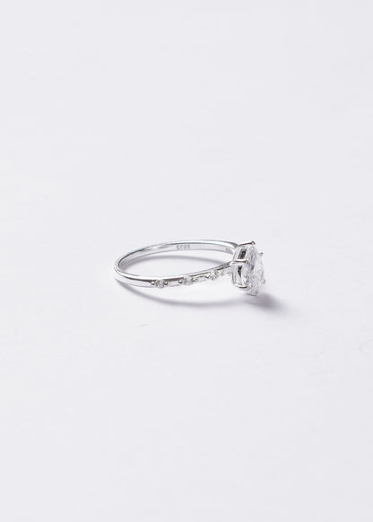 Anillo gota zirconia con laterales plata 925