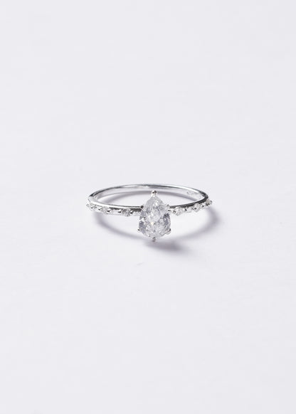 Anillo gota zirconia con laterales plata 925