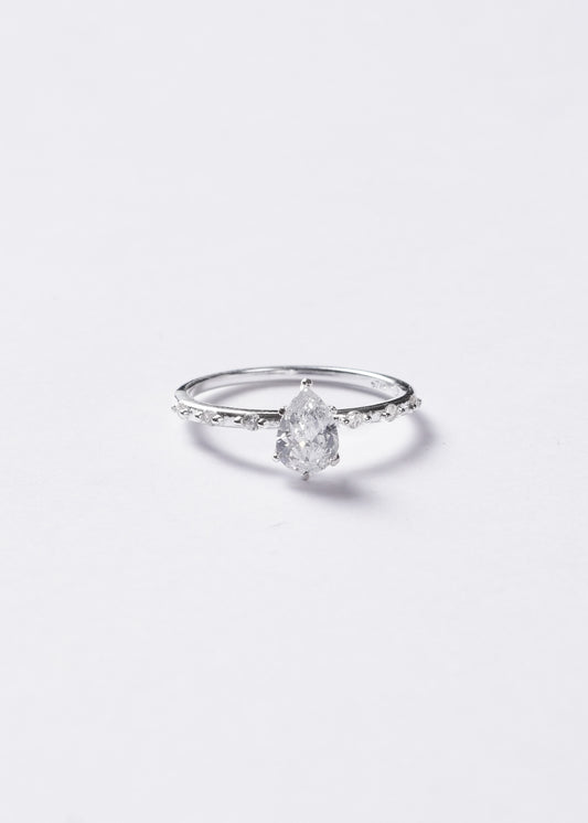Anillo gota zirconia con laterales plata 925