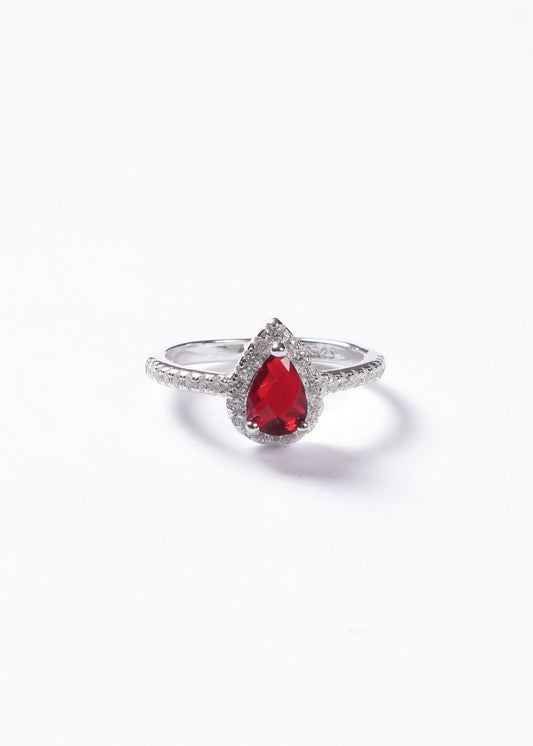 Anillo gota roja zirconias laterales plata 925