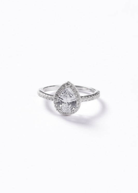 Anillo gota blanca zirconias laterales plata 925