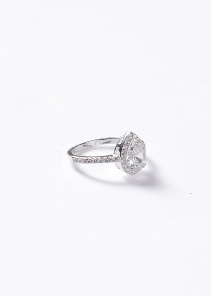Anillo gota blanca zirconias laterales plata 925