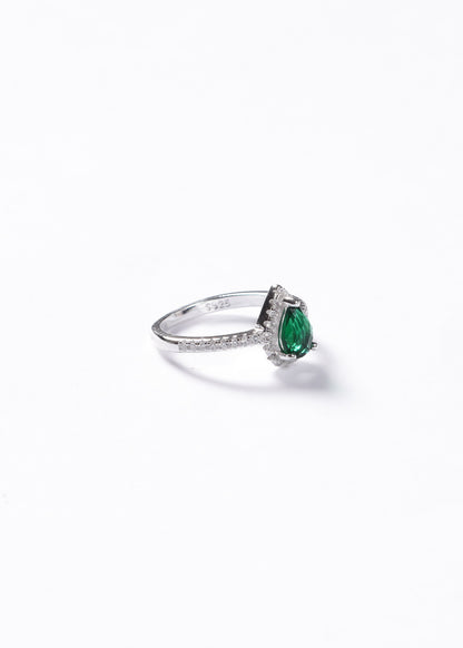 Anillo gota verde esmeralda zirconias laterales plata 925