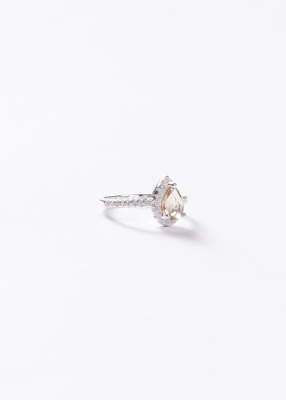 Anillo gota amarillo champagne zirconias laterales plata 925