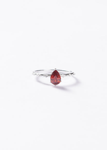 Anillo gota roja zirconia con laterales plata 925