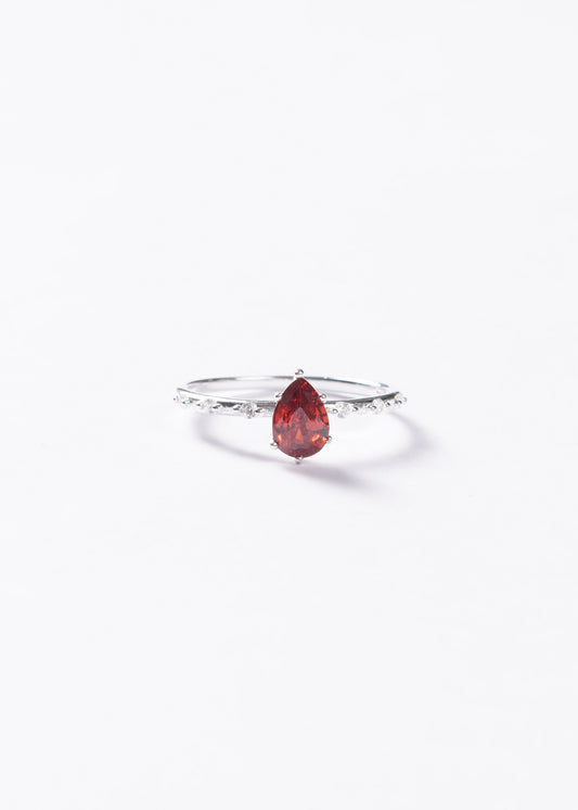 Anillo gota roja zirconia con laterales plata 925