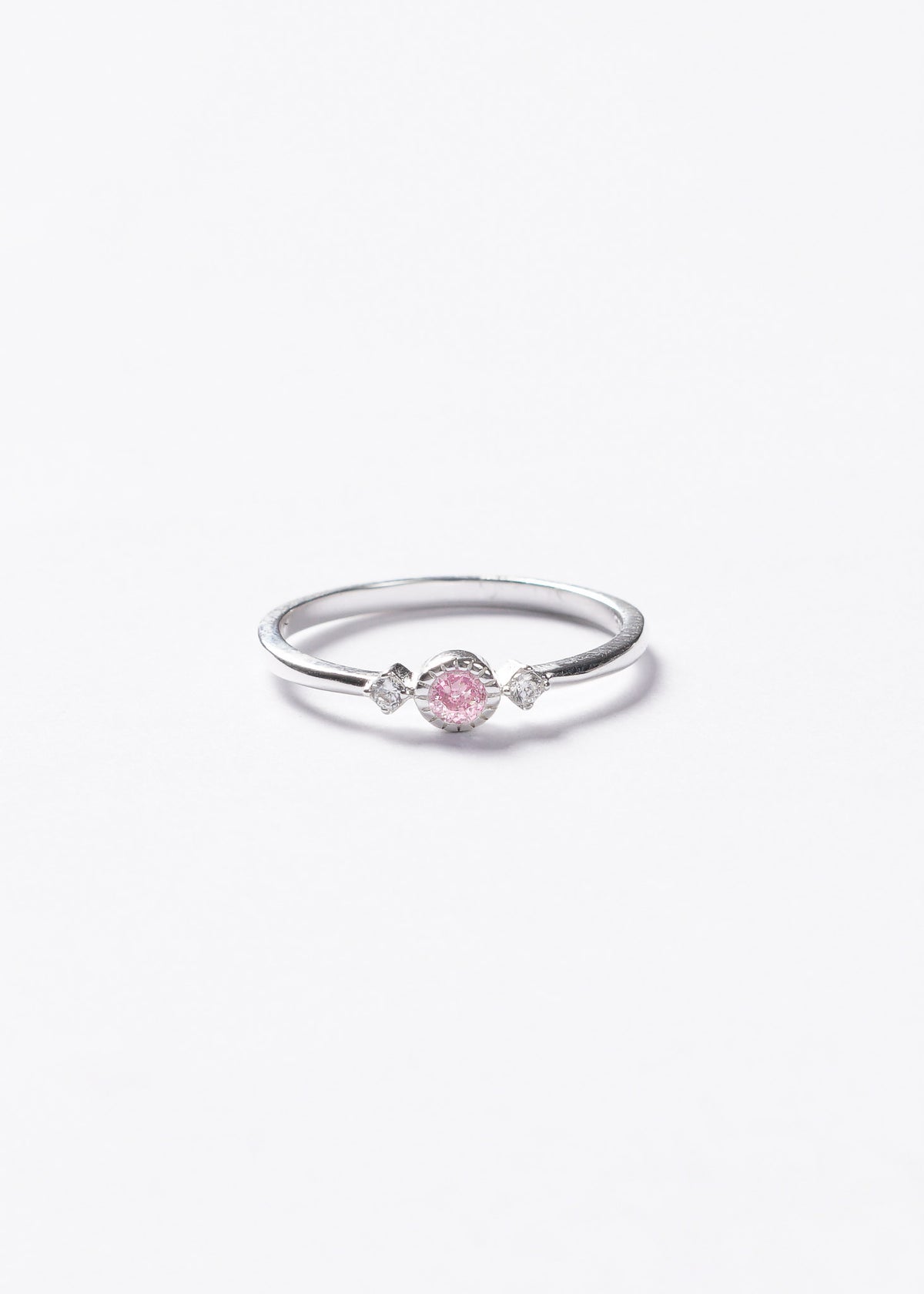 Anillo punto luz rosa y laterales plata 925