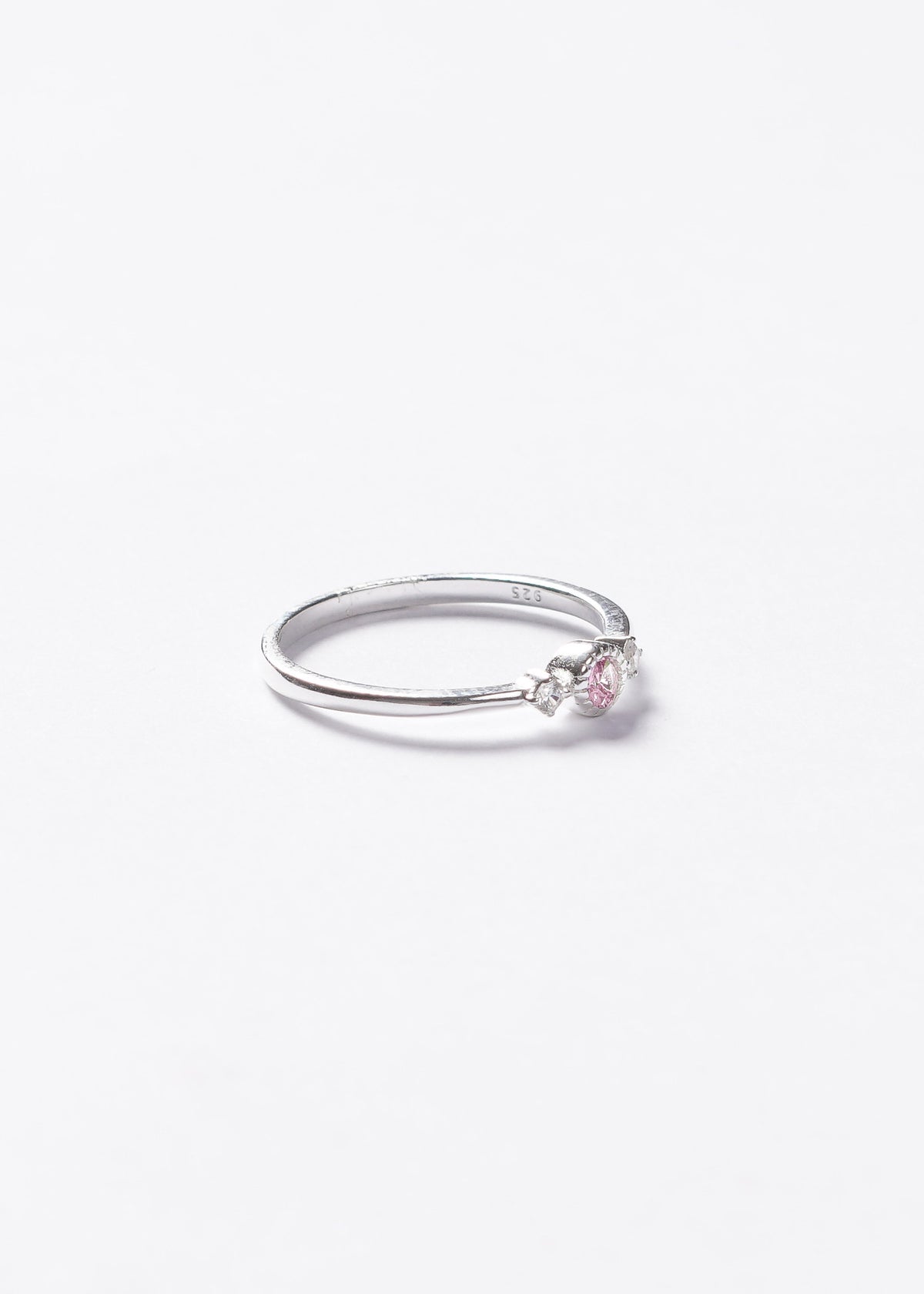 Anillo punto luz rosa y laterales plata 925