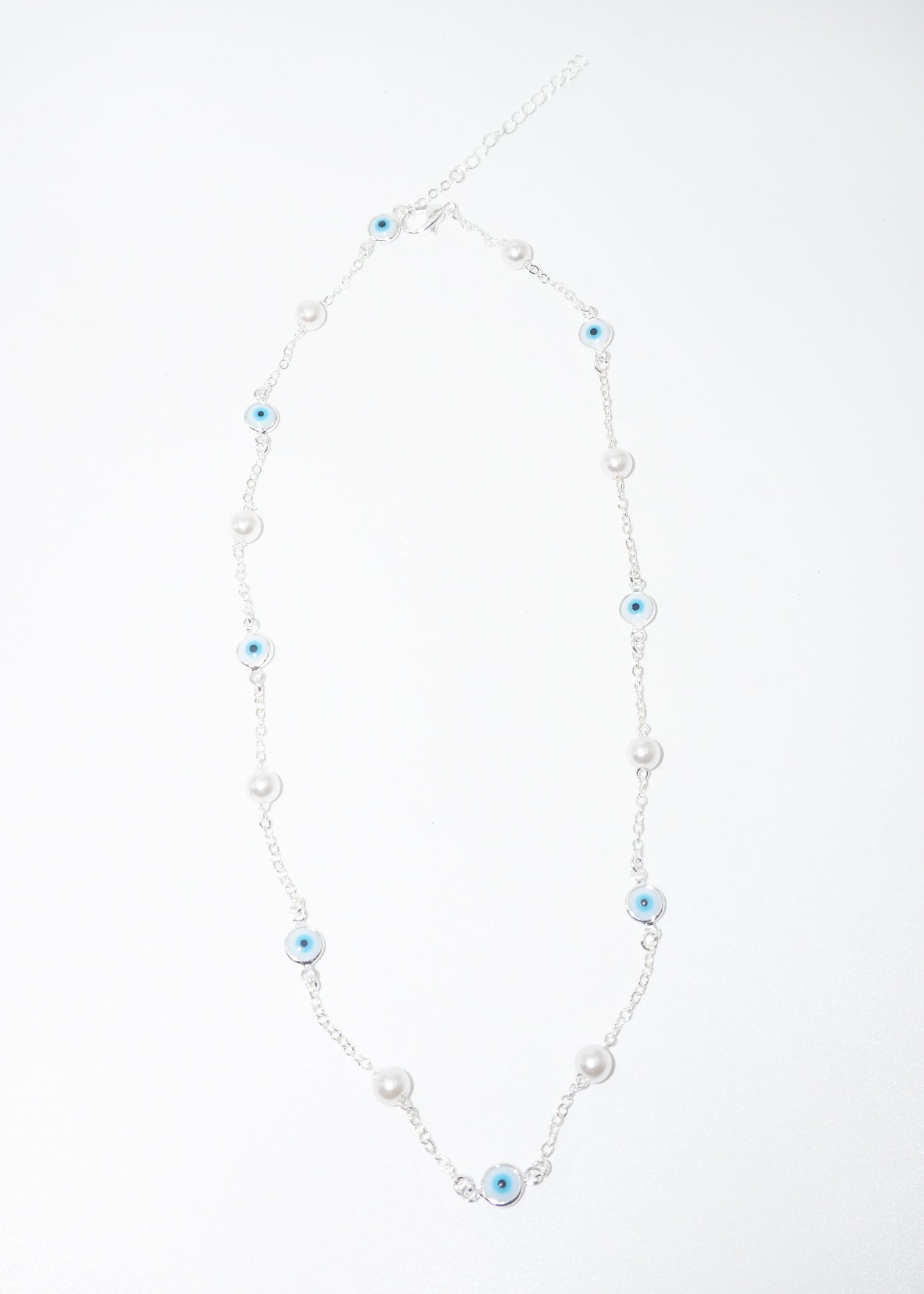 Collar cadena perlas y ojos turcos