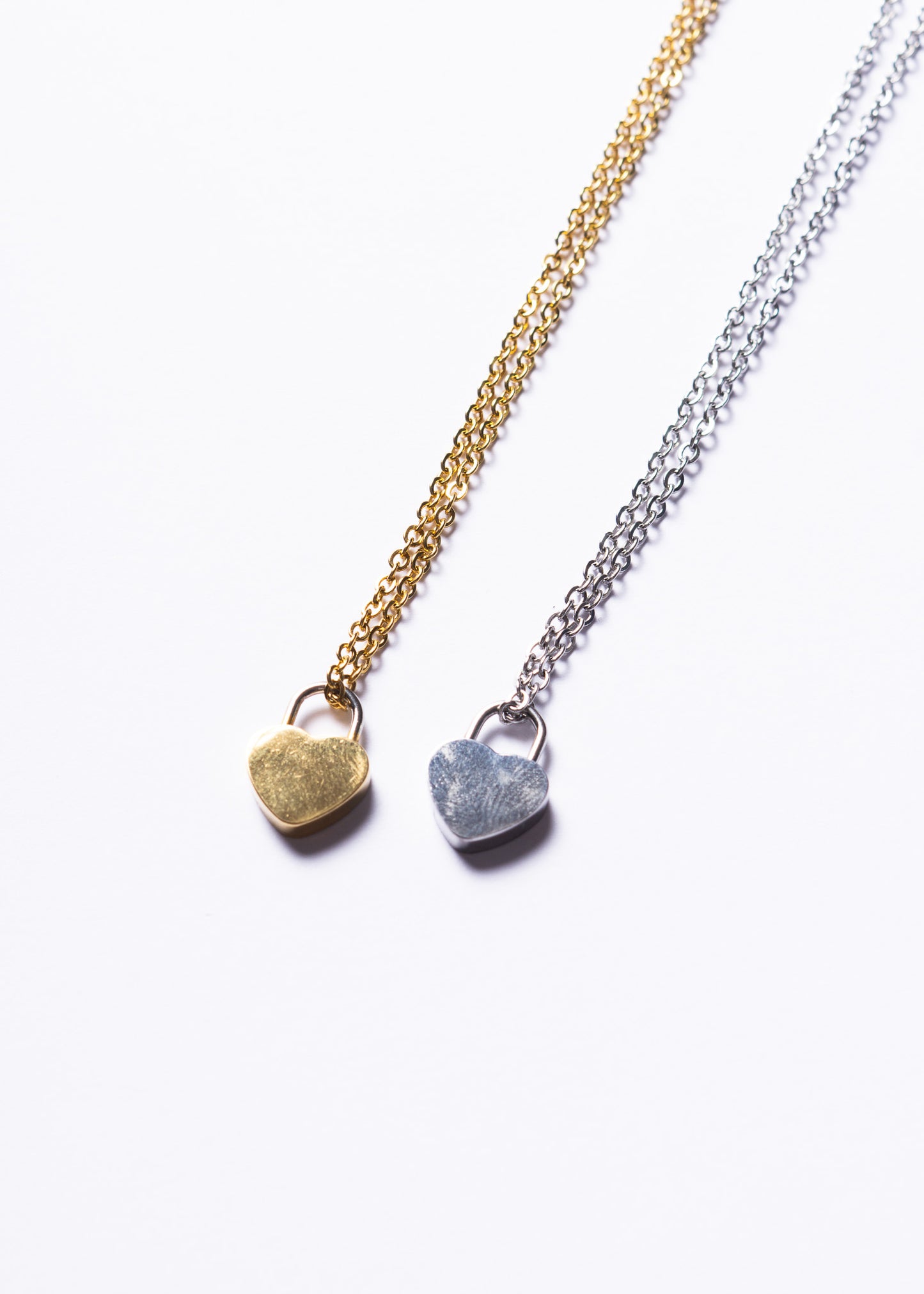 Set x2 collares con dije corazón candado acero quirúrgico