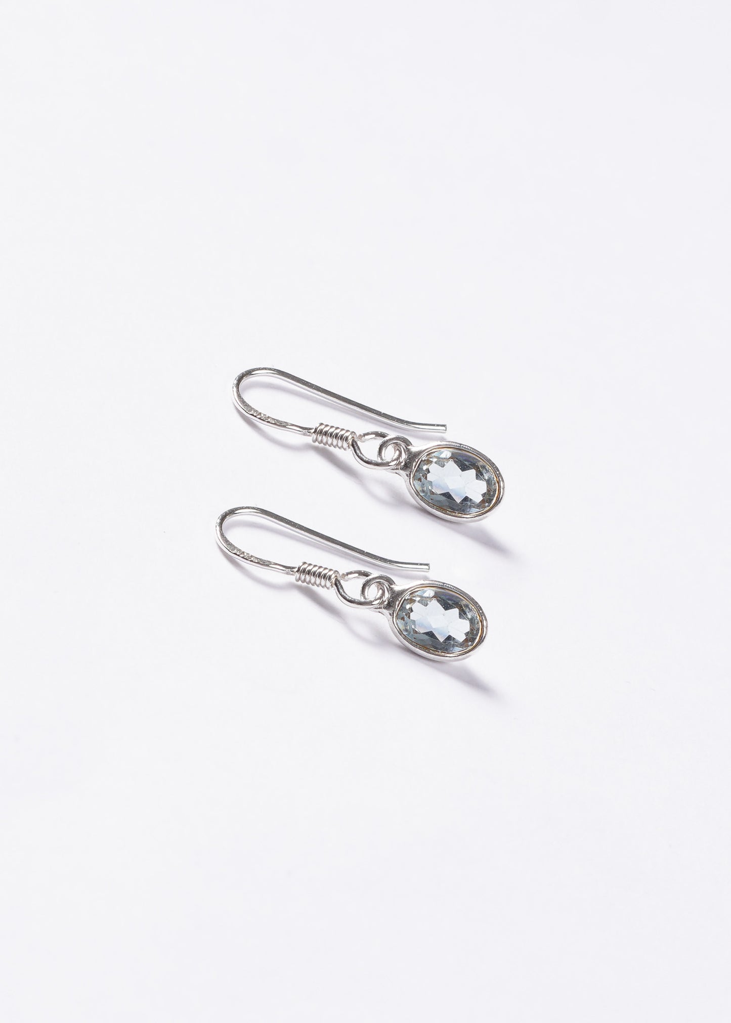 Caravanas colgantes topacio celeste oval plata 925 - Claridad