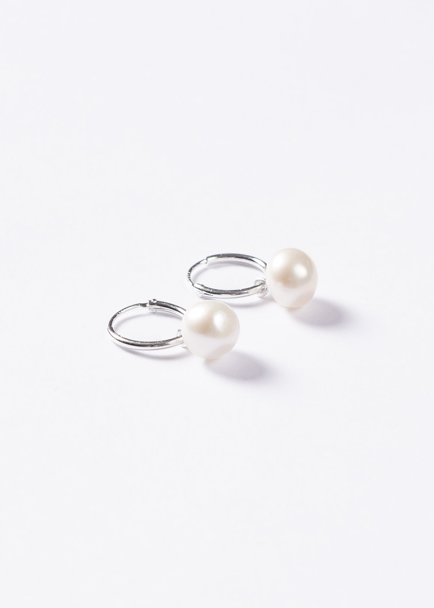 Caravanas aros 12mm con perla de río plata 925