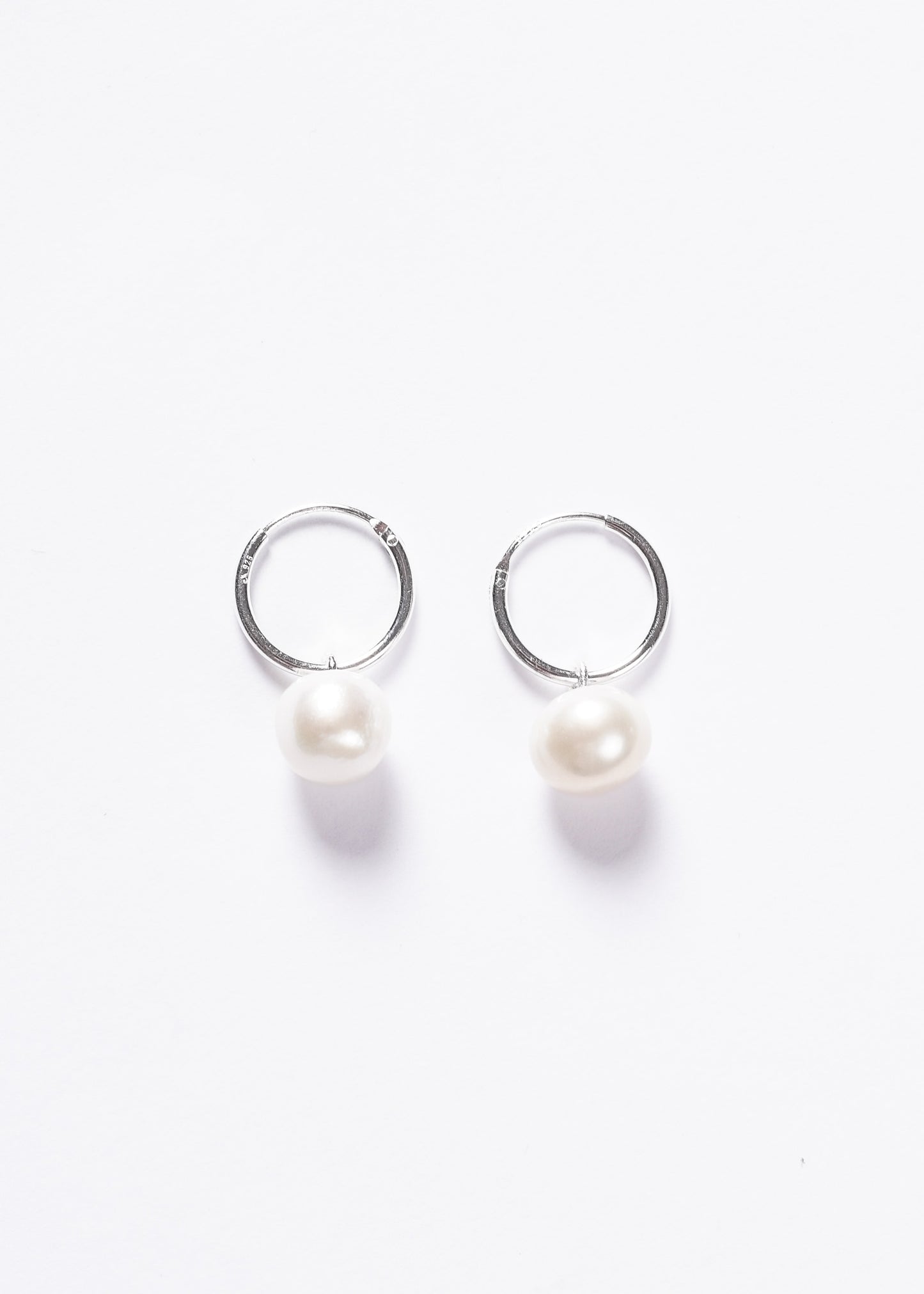 Caravanas aros 12mm con perla de río plata 925