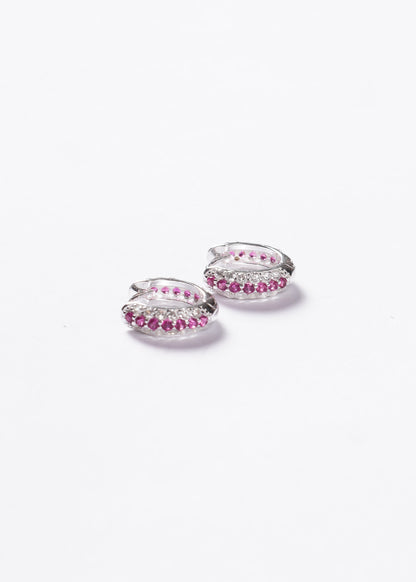 Caravanas aros huggies fila central zirconia fucsia plata 925