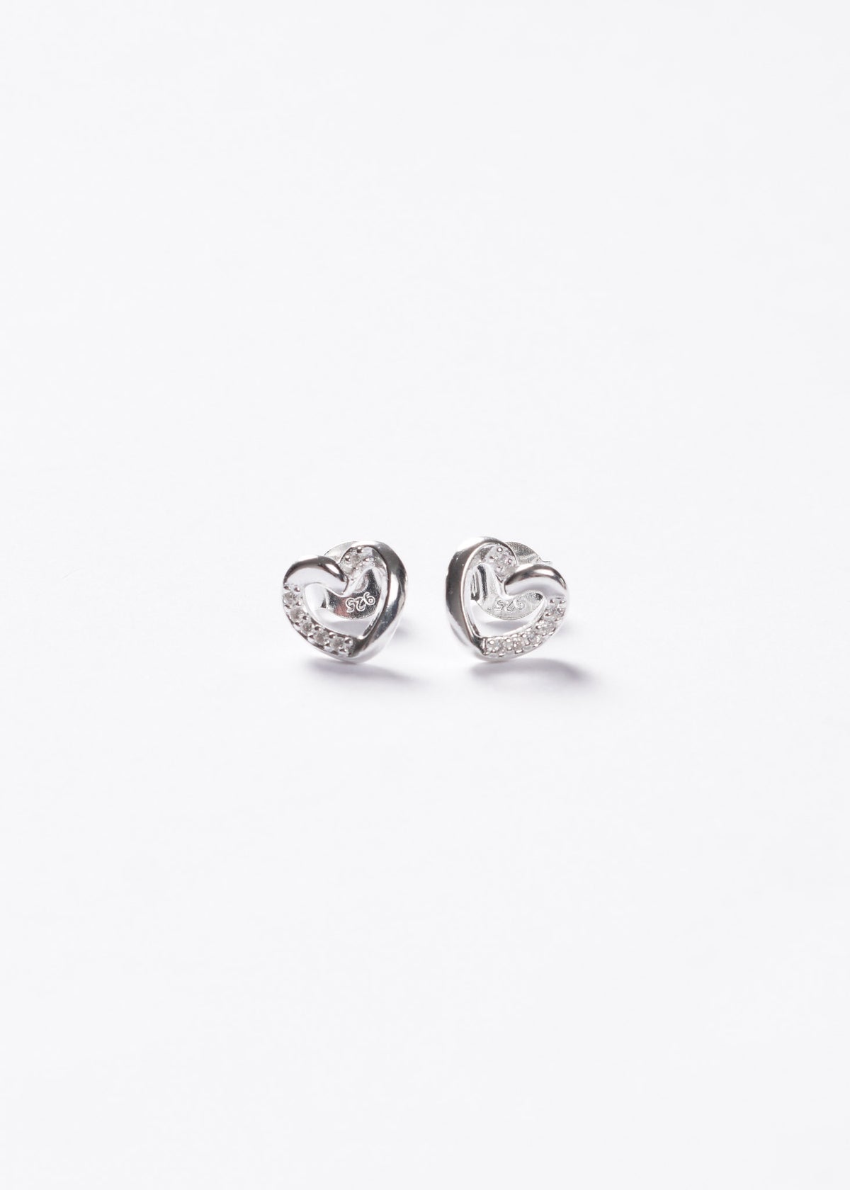 Caravanas corazón mitad zirconias Plata 925